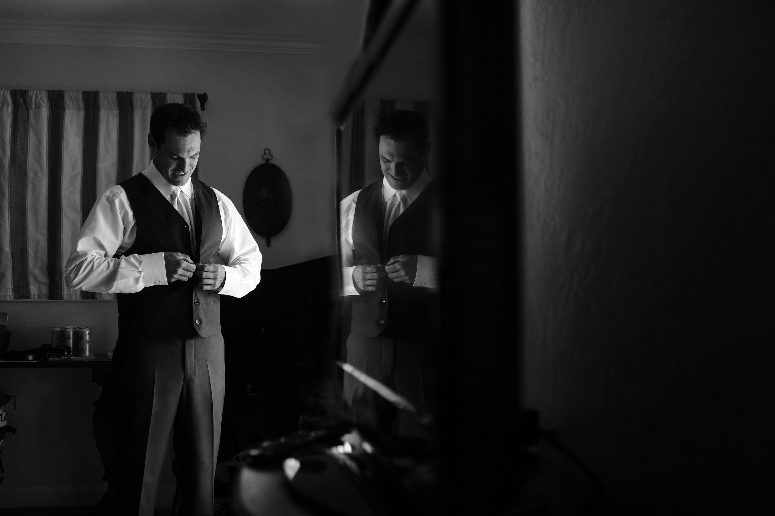  Groom getting ready for backyard wedding in Sonoma California. 