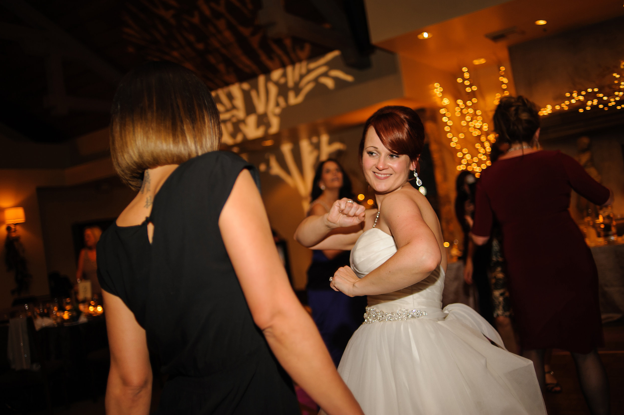  Bride dancing during wedding reception at Wine and Roses in Lodi California.&nbsp; 