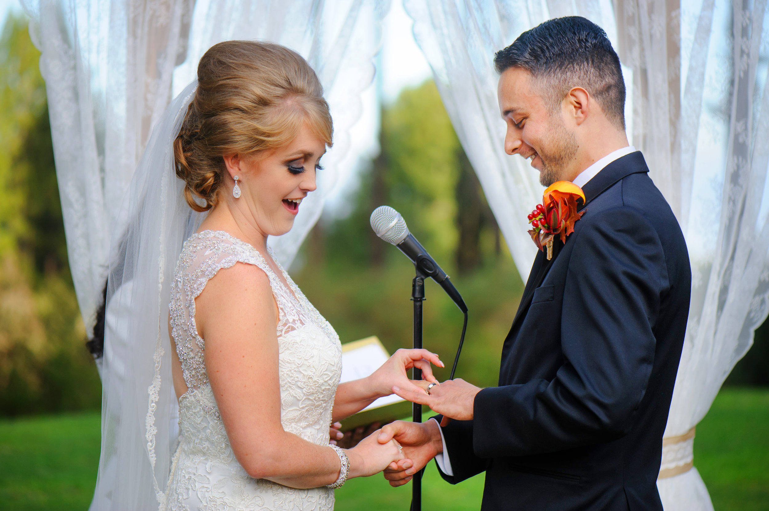  Ring exchange during wedding ceremony at The Mountain Terrace in Woodside California. 