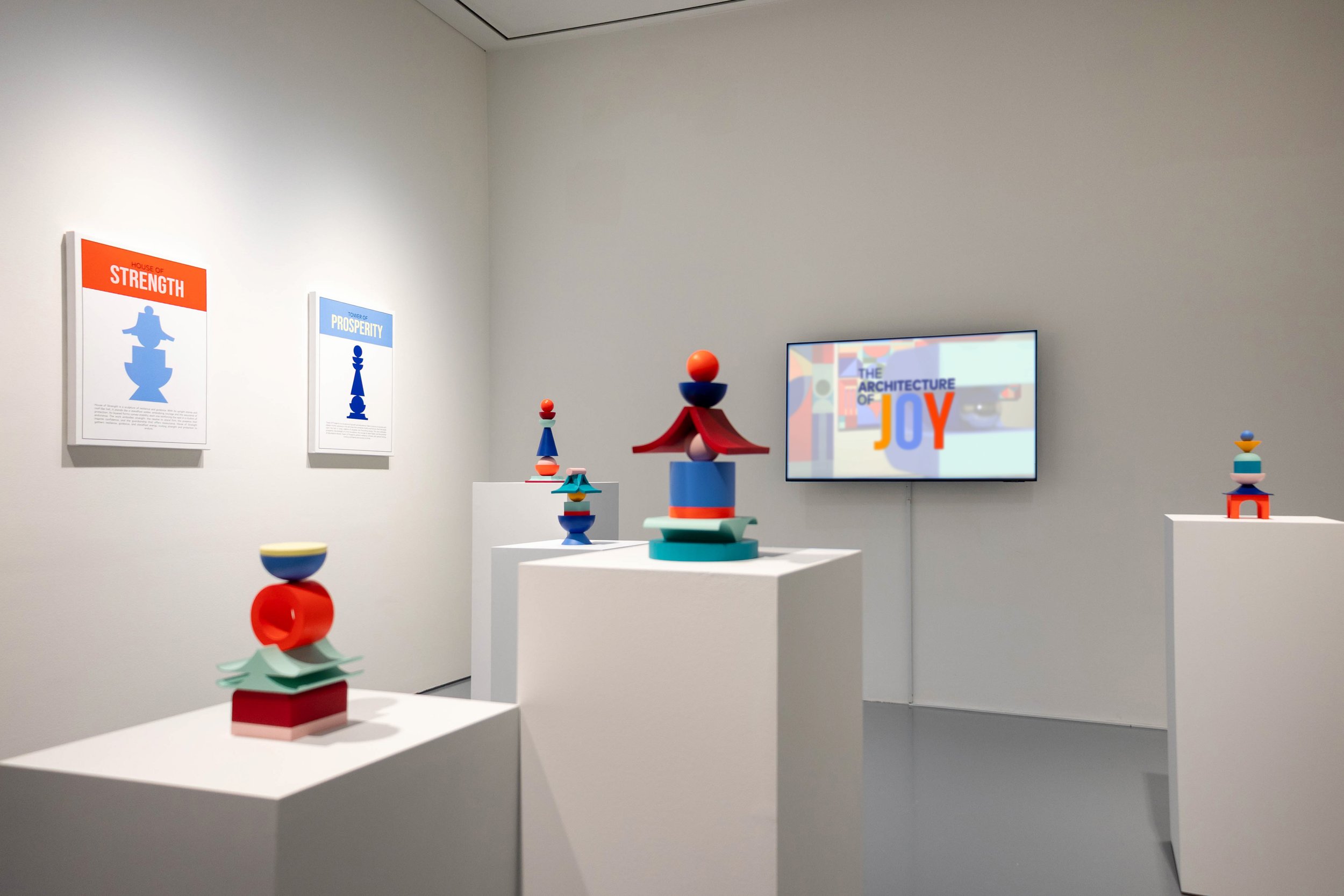 The Building Block Estate sculptural installation by Cynthia Mak, featuring vibrant minimalist Asian architectural shapes.