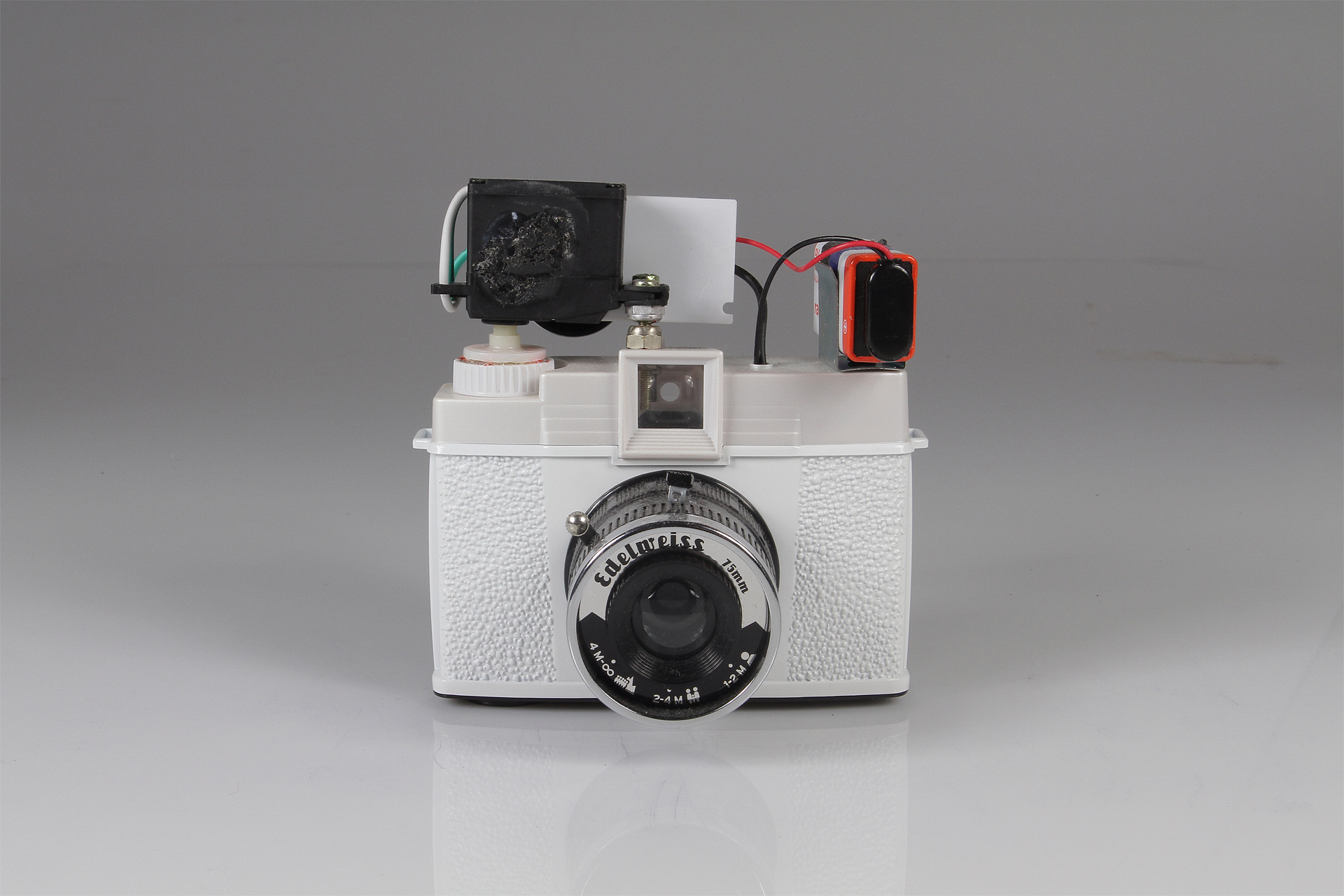   Diana Slitscan Camera  2016.&nbsp; Modified Diana+ with 35mm film back for Strip Photography.&nbsp; Diana+ camera, modified servo motor, pulse-width modulation circuit (for motor speed control), 9v battery, battery clip, electrical wire, salvaged n