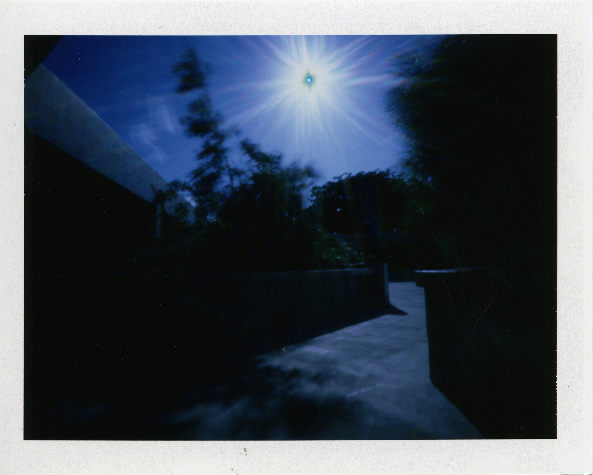"UH Manoa Art Department at 970mph" 2016. Archival Pigment Print from Fujifilm FP100-C Instant Photographs. 17x44"