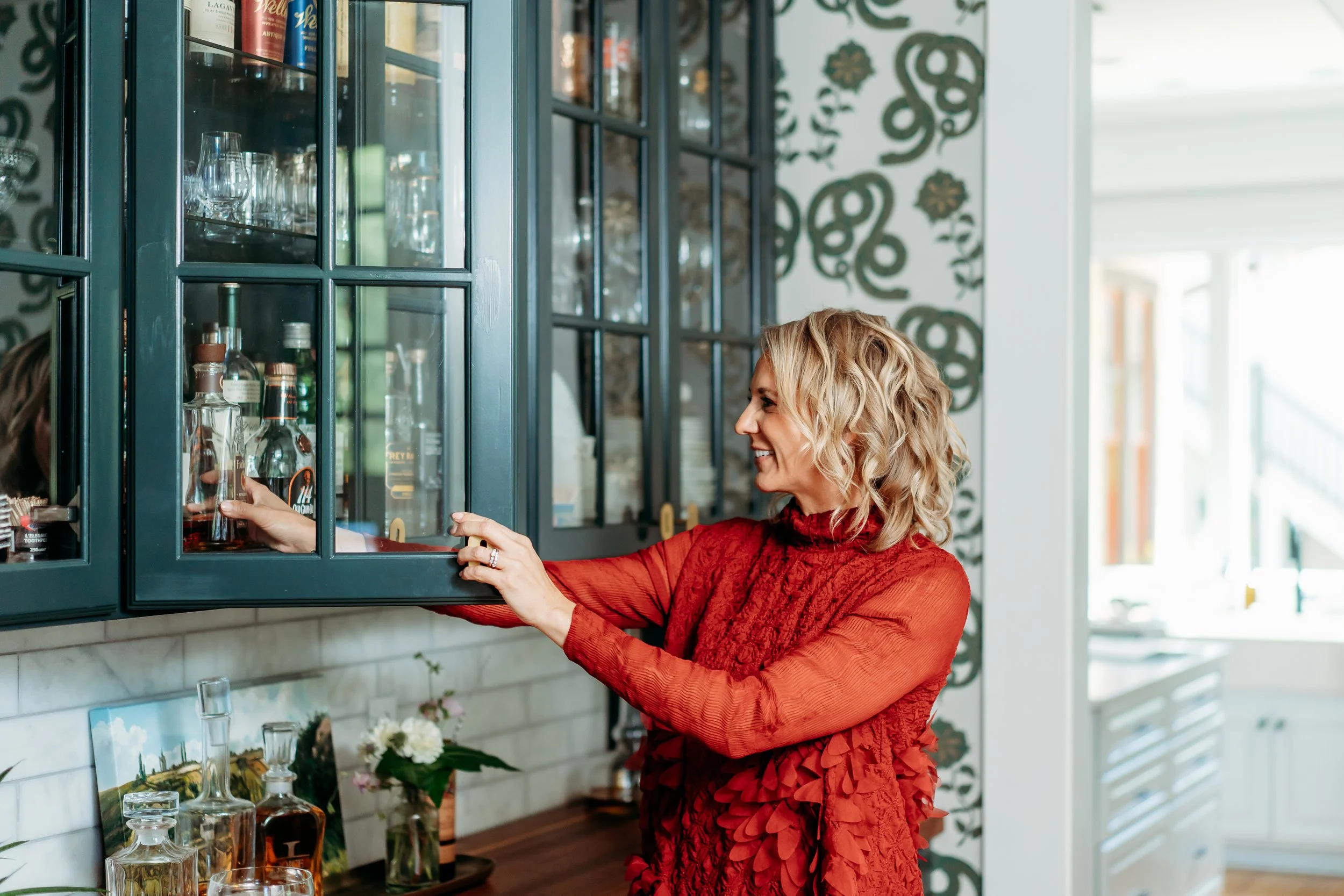 Lifestyle brand image of interior designer in kitchen of  Cumming, GA home 