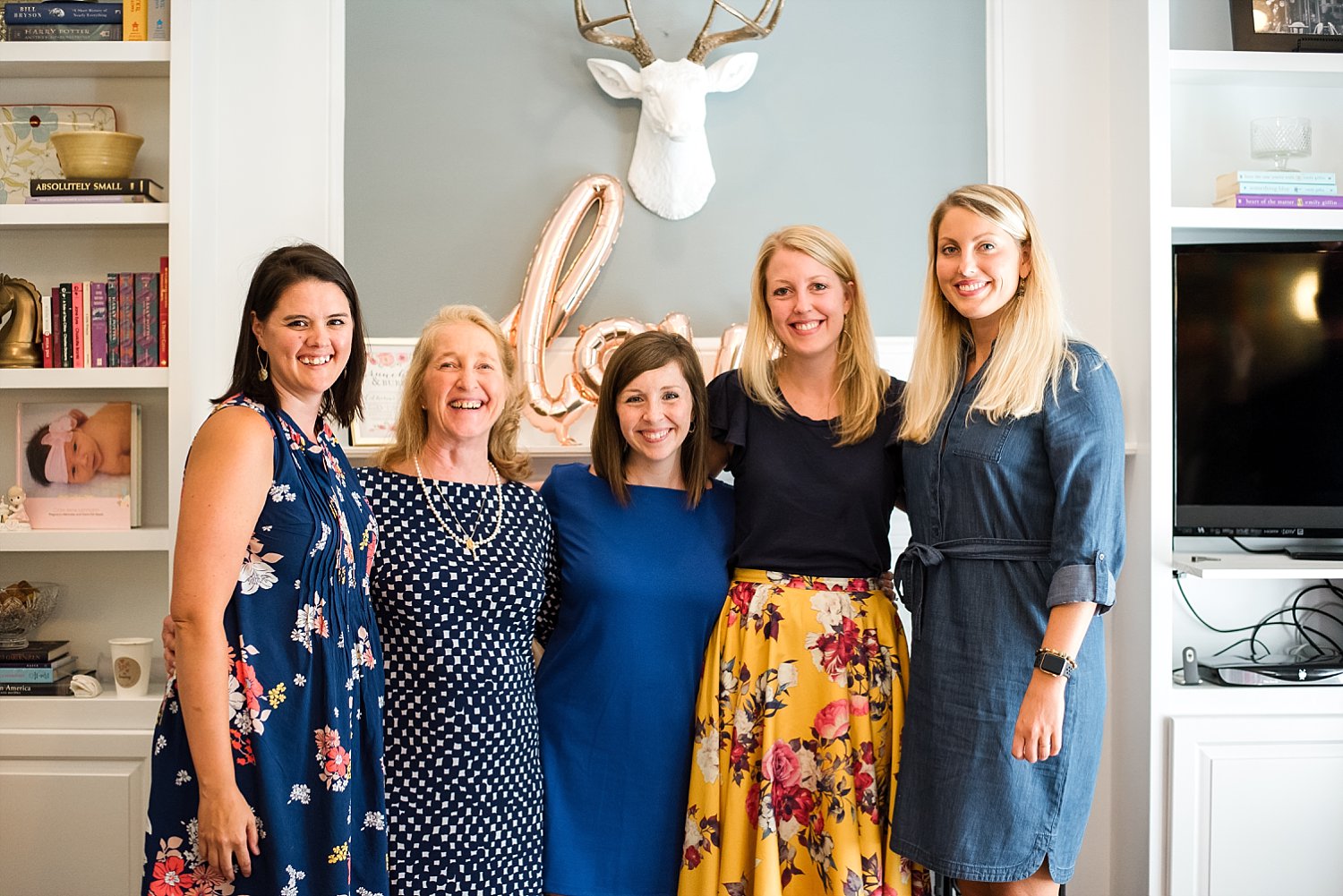 bride with hostesses at bridal shower