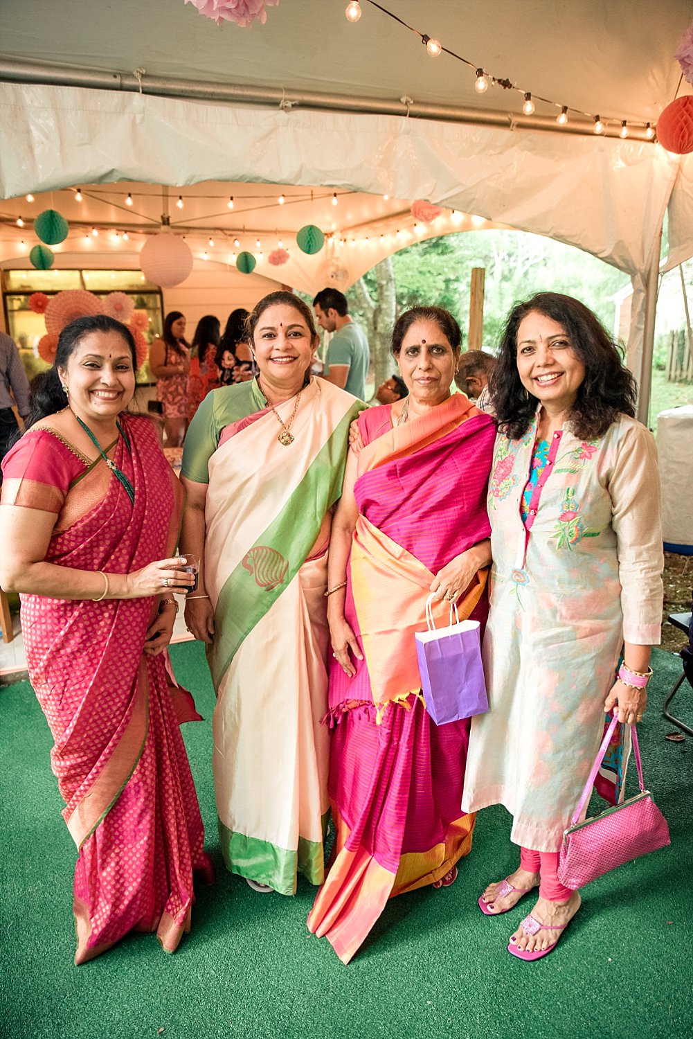 4 women in Saris at baby shower in Roswell, GA