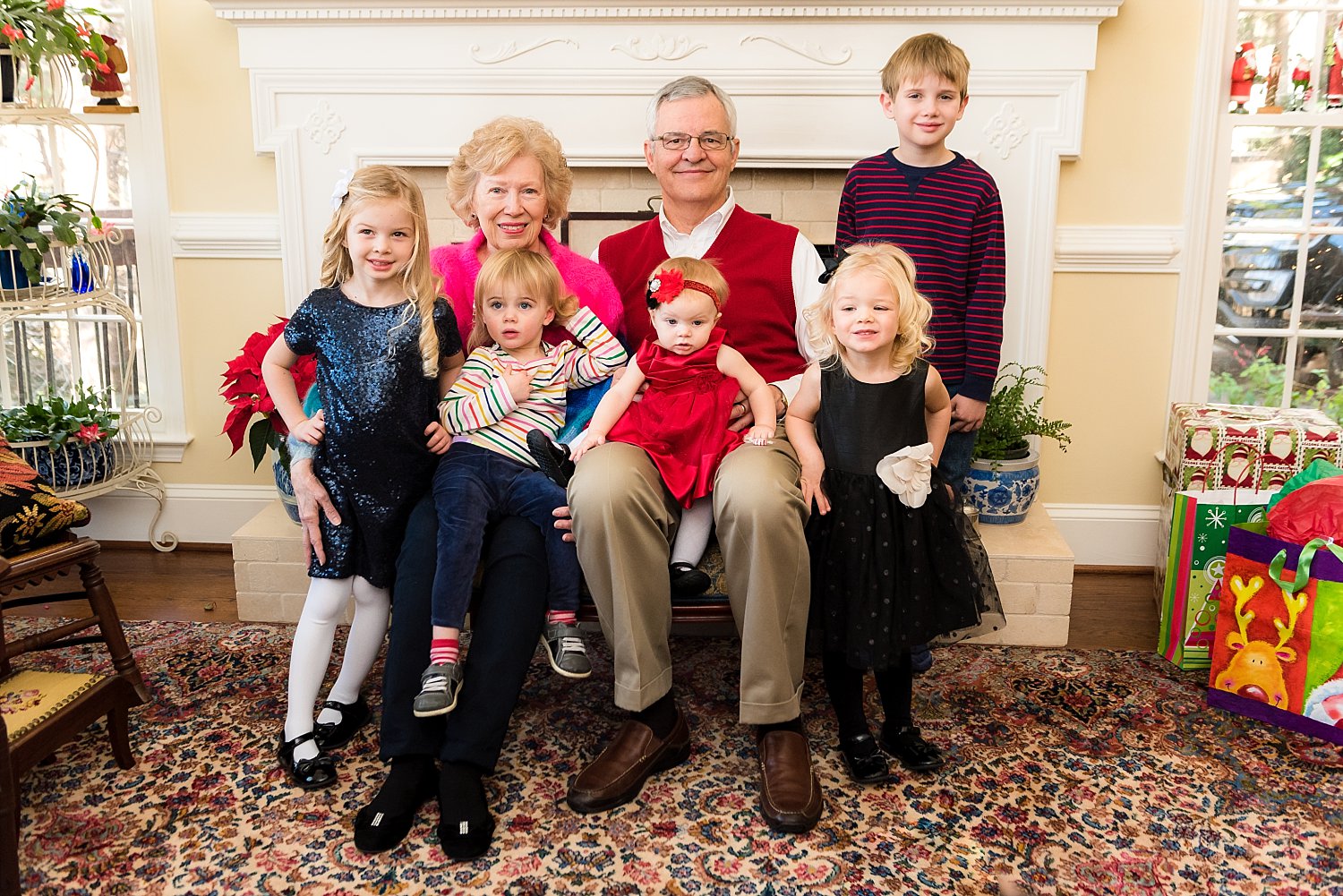 grandparents sitting with 5 grandkids