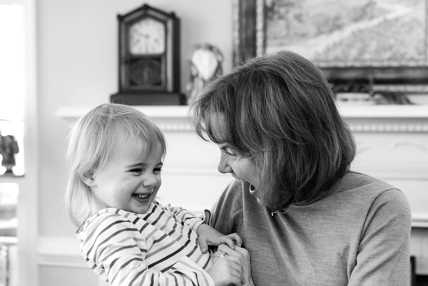mother and daughter laughing