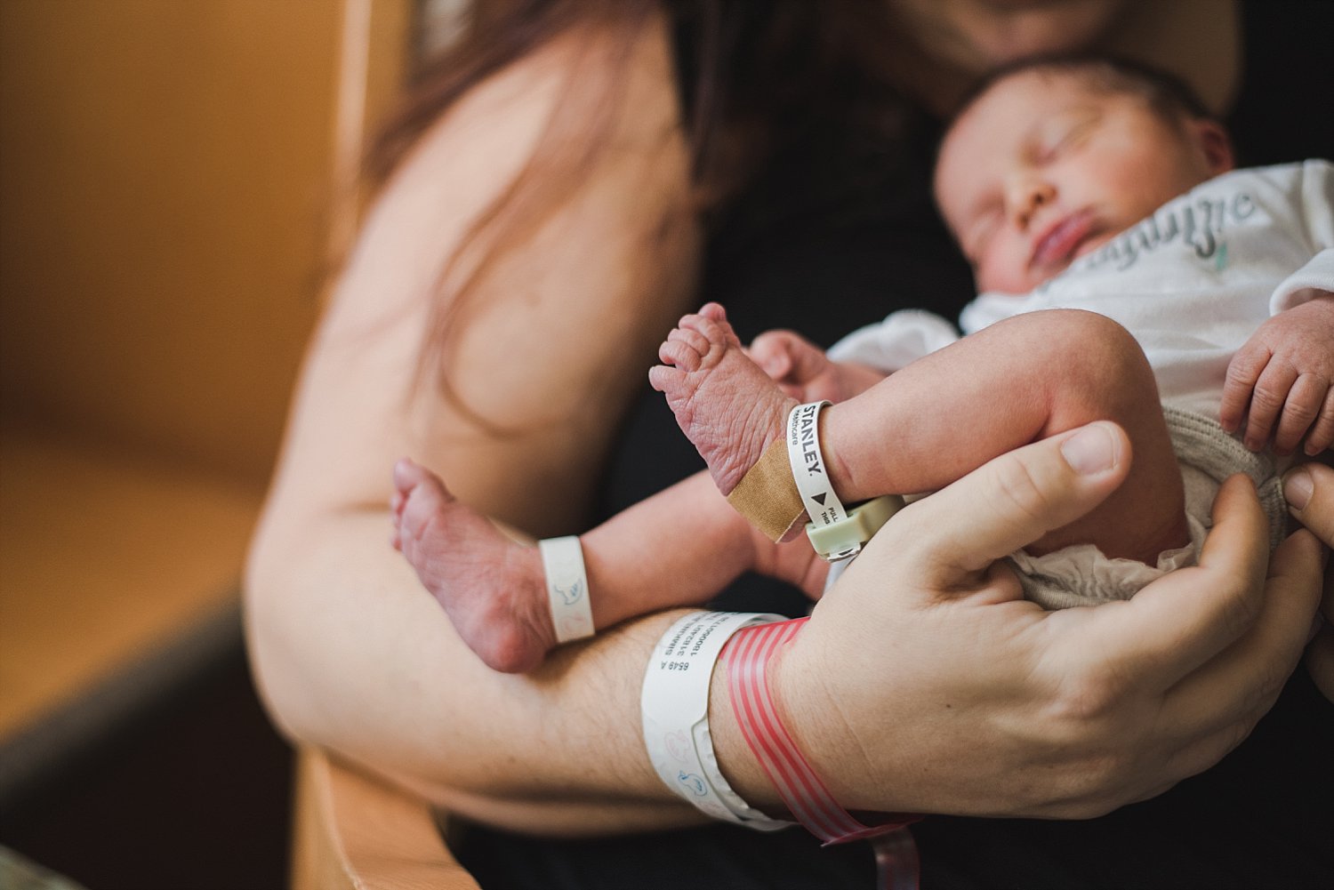 Close up of newborn baby feet and bracelets at Northside Atlanta Hospital