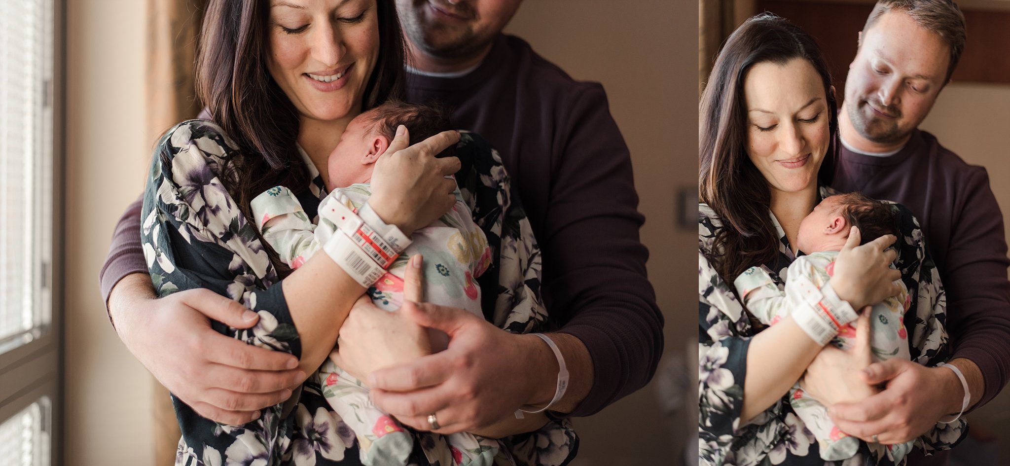 parents hugging and holding newborn baby girl