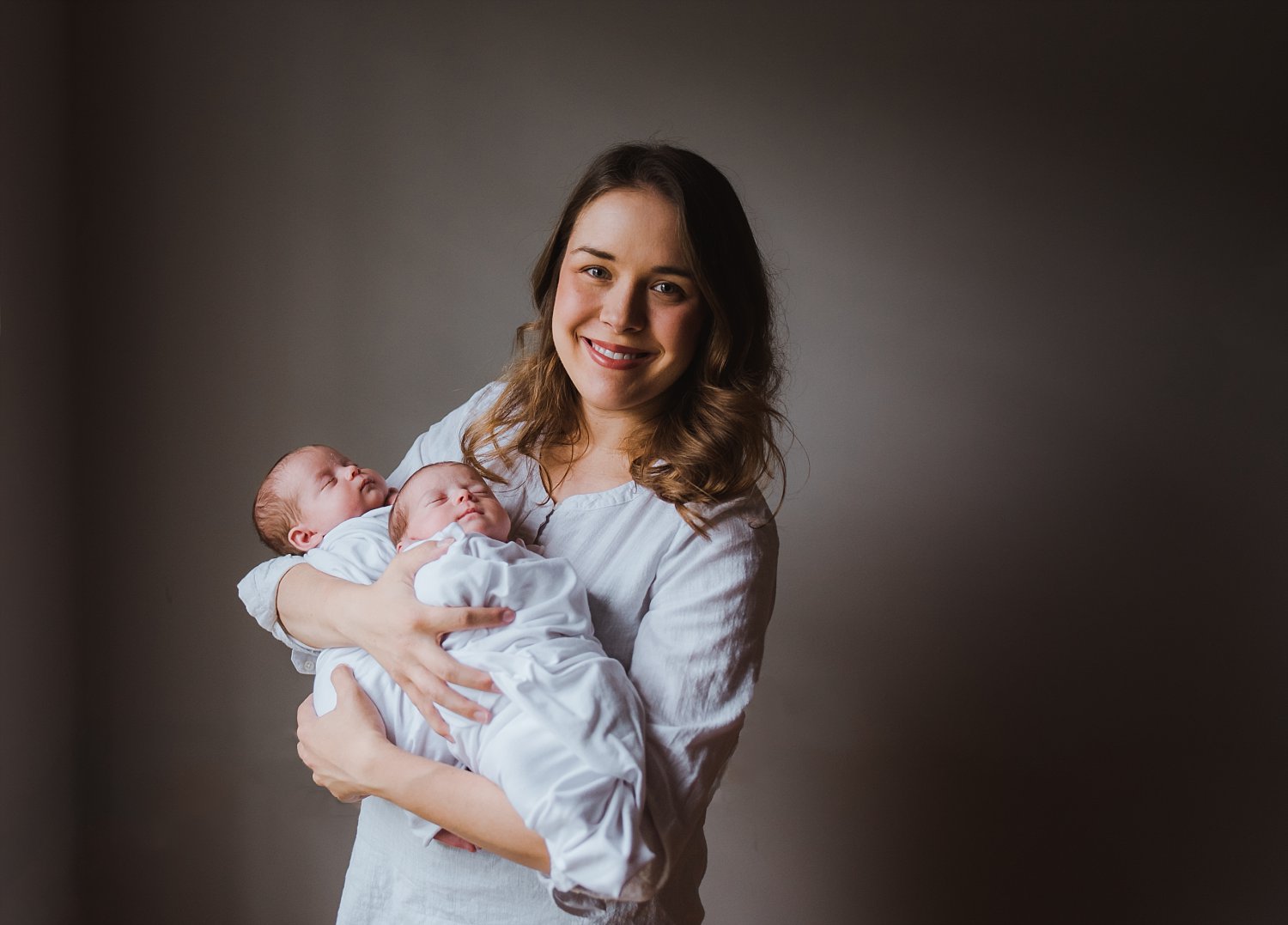 mother and newborn baby twin girls