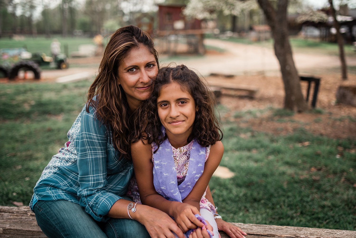 mother and daughter smiling at Scottsdale Farms in Milton, GA