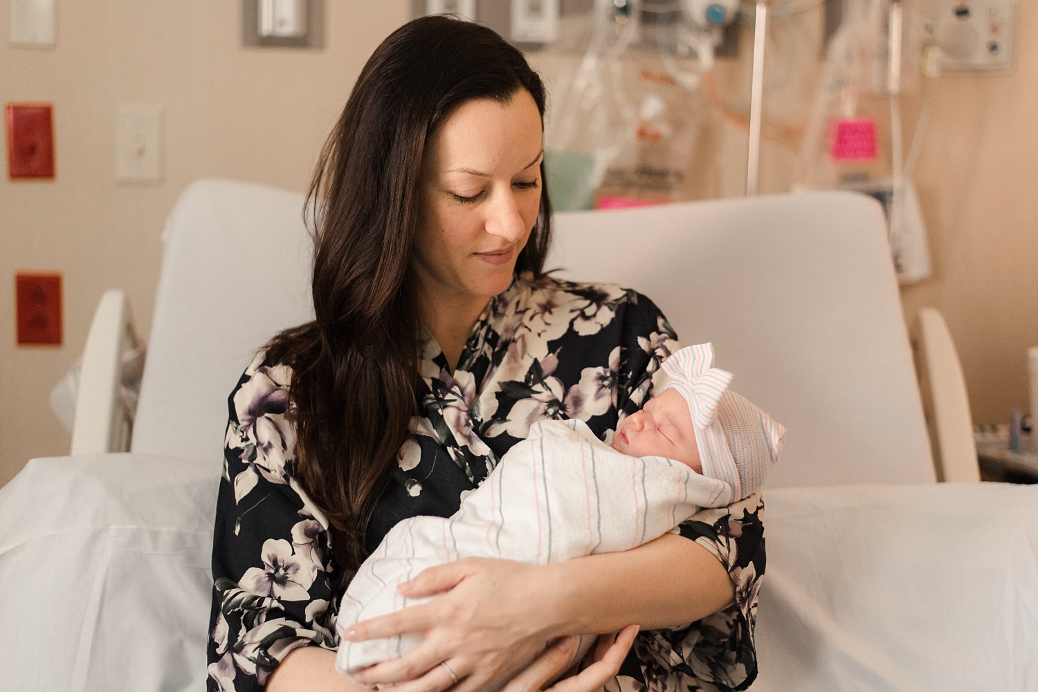 Mother with newborn baby girl at Emory John's Creek hospital