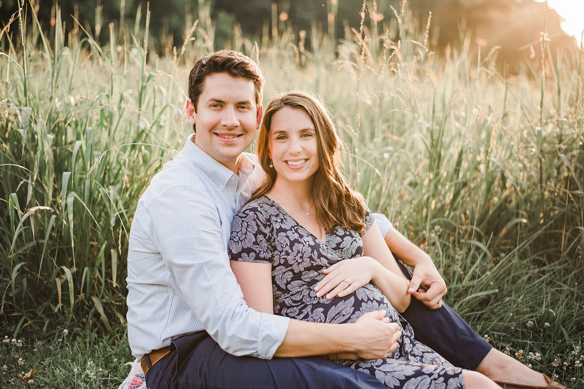 Expecting Couple in field of tall grass Marietta, GA