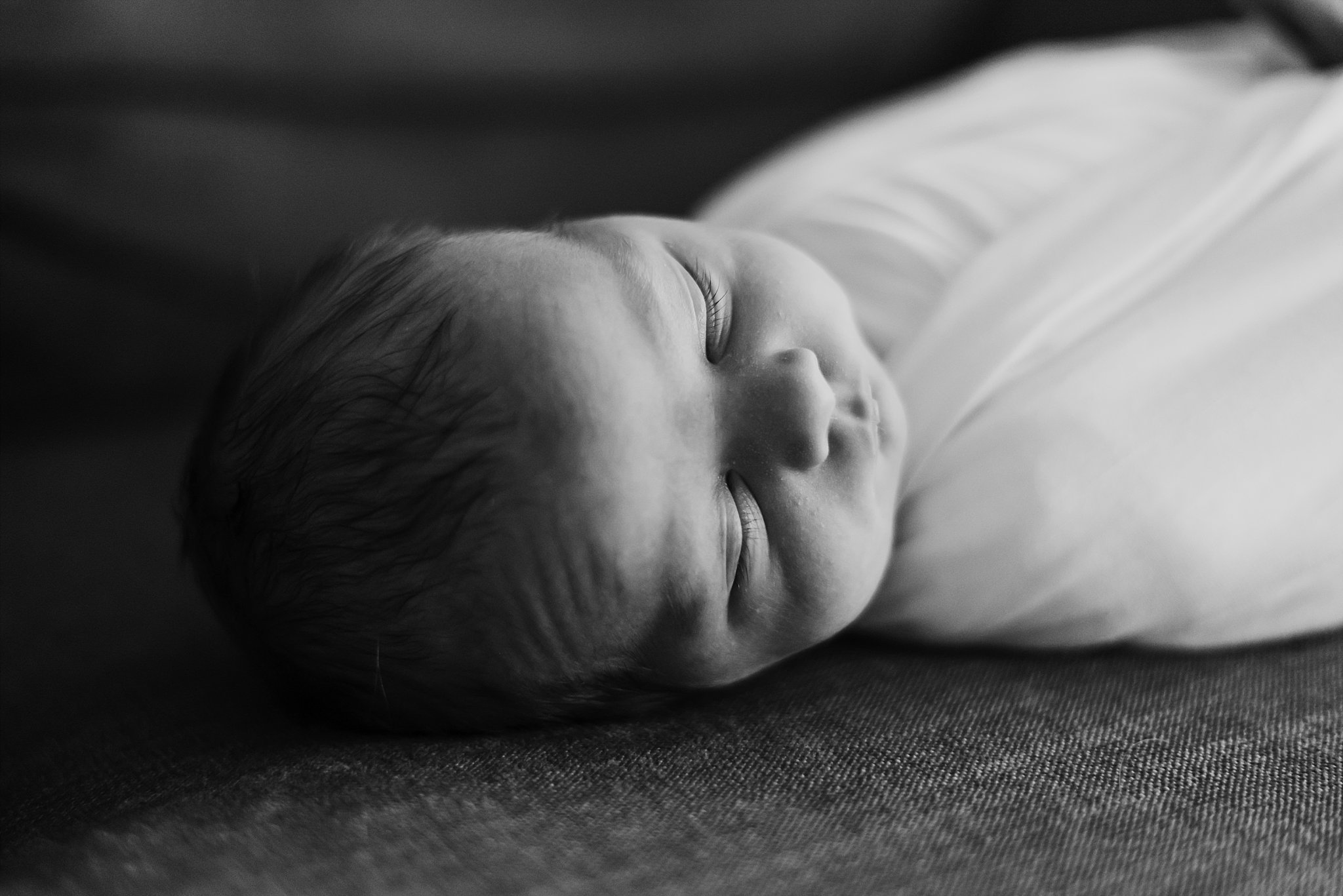 black and white portrait of sleeping baby boy