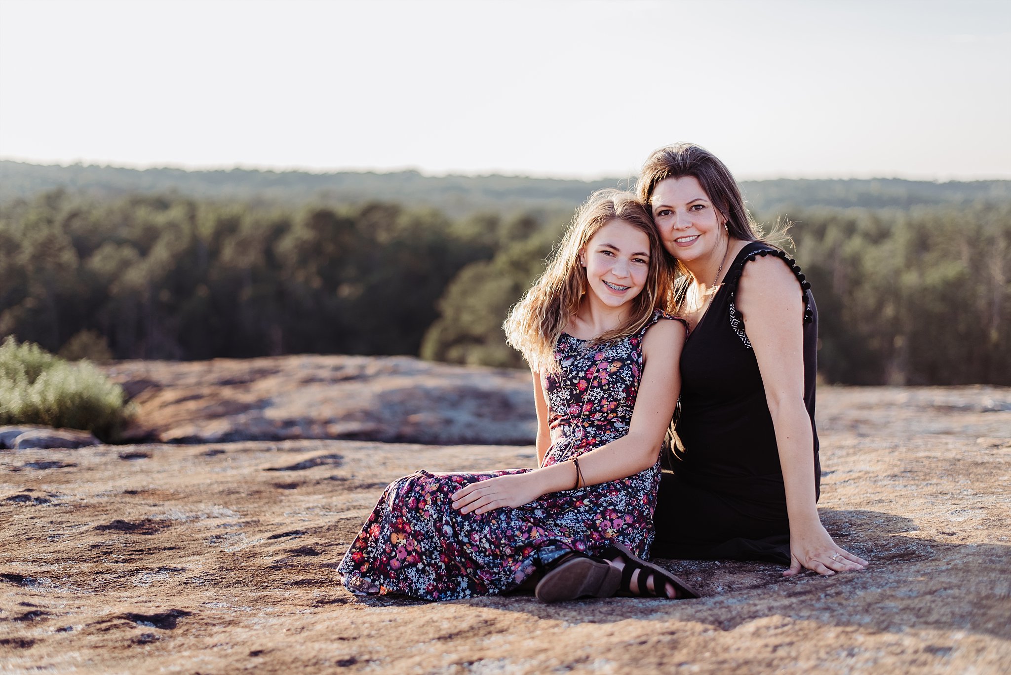 mother and daughter portrait sitting on Arabia Mountain Atlanta