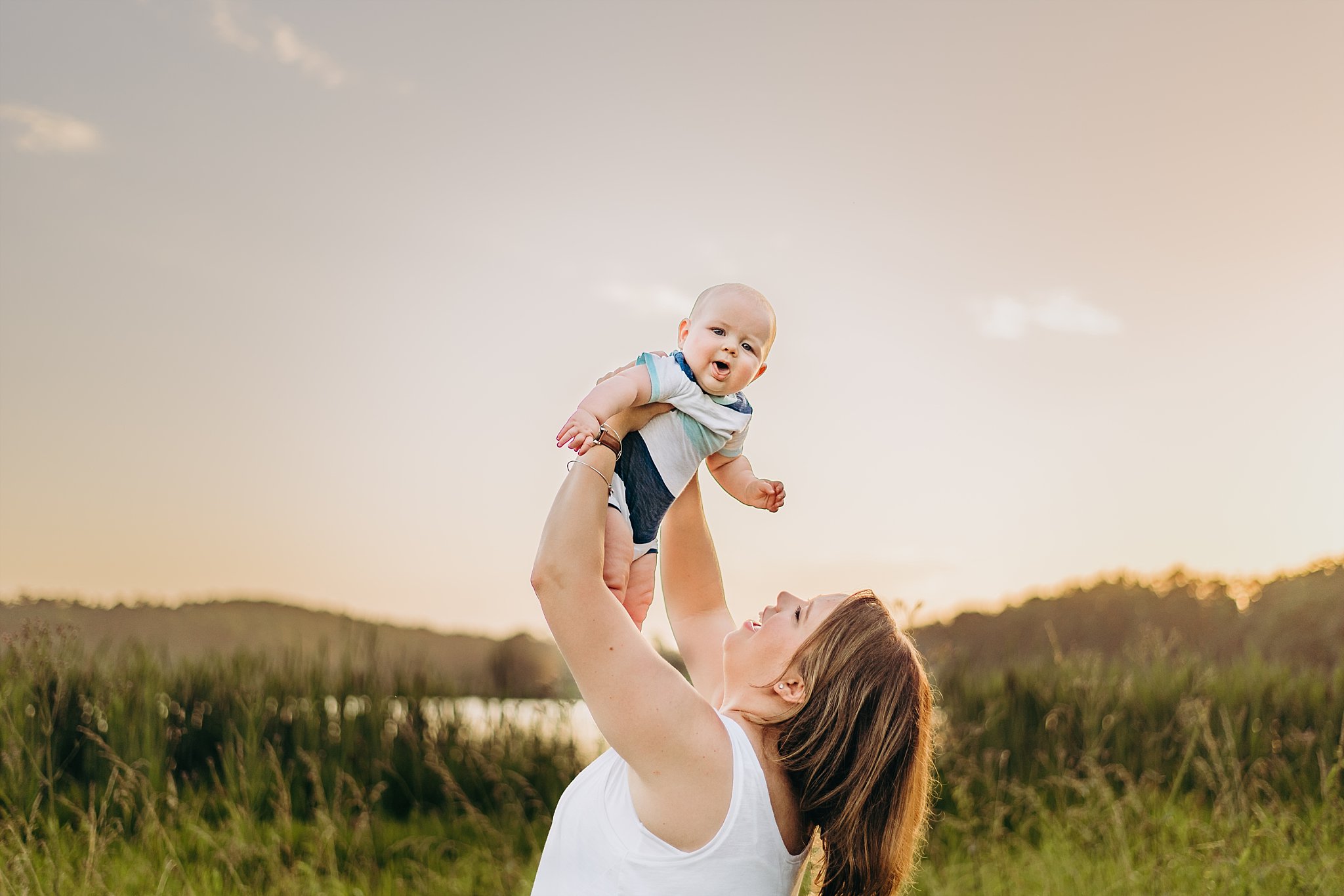 mom holding up baby Lake Acworth Cauble Park