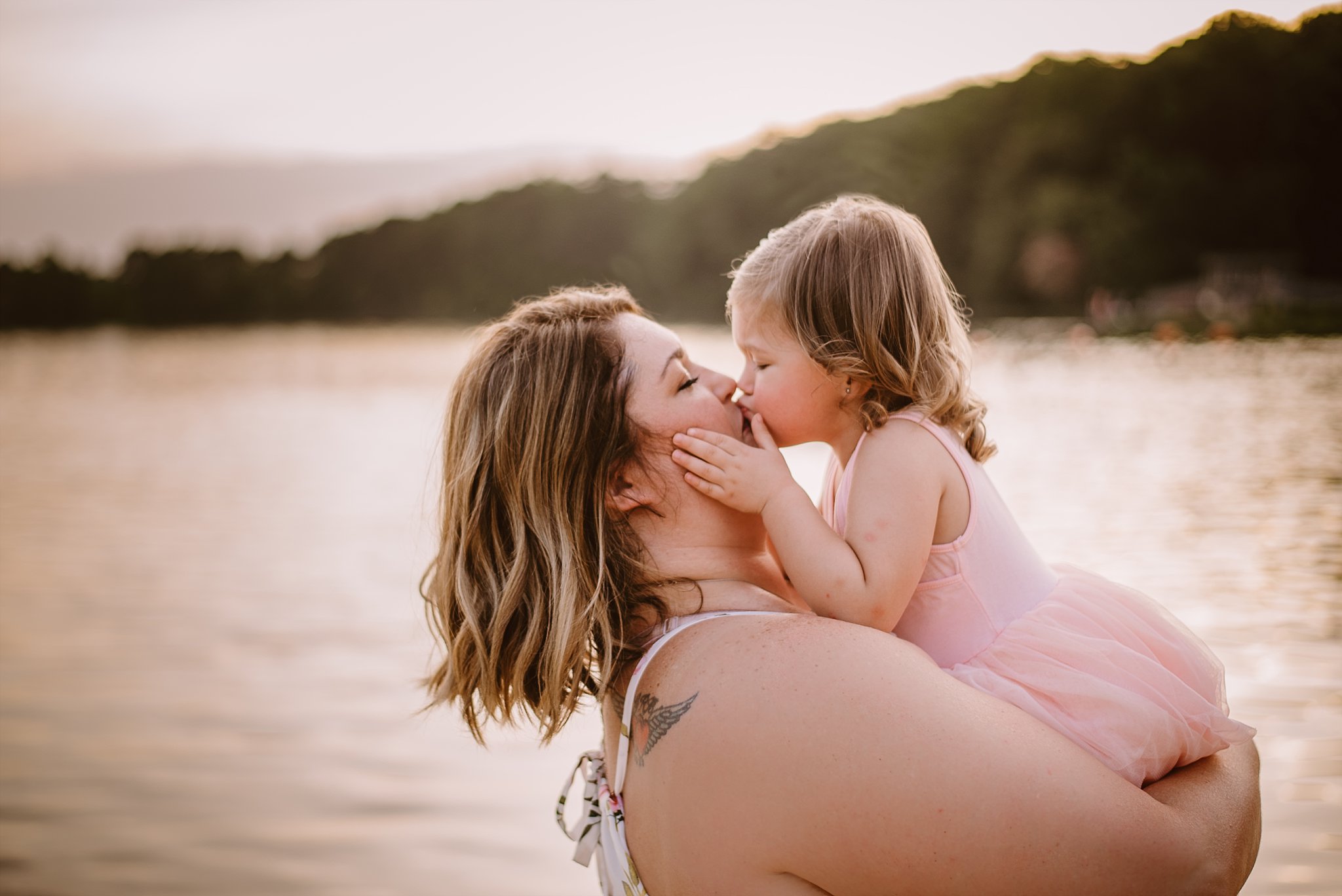 toddler girl kissing mom at beach Cauble Park Lake Acworth
