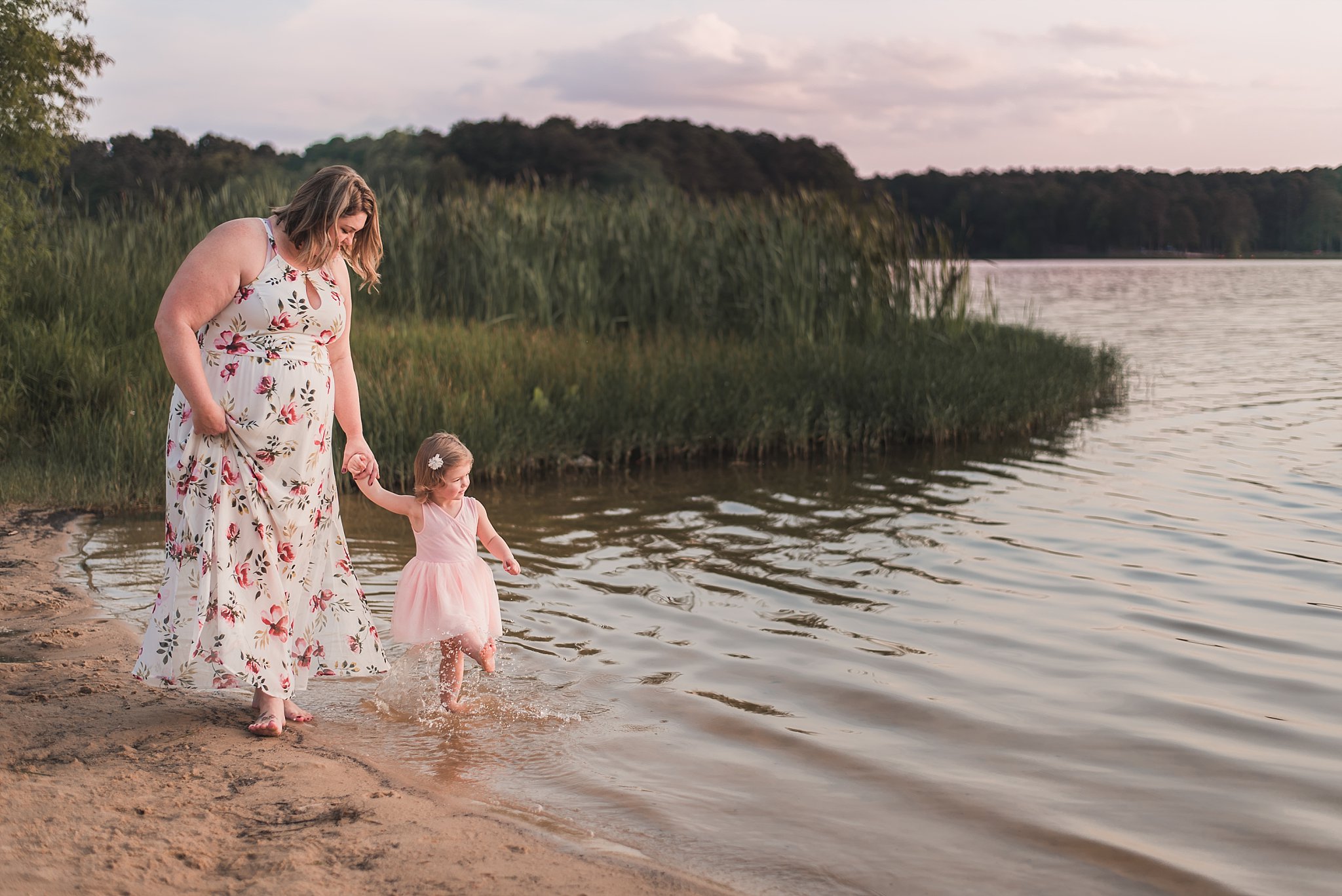 mother and daughter walking on beach Cauble Park Lake Acworth