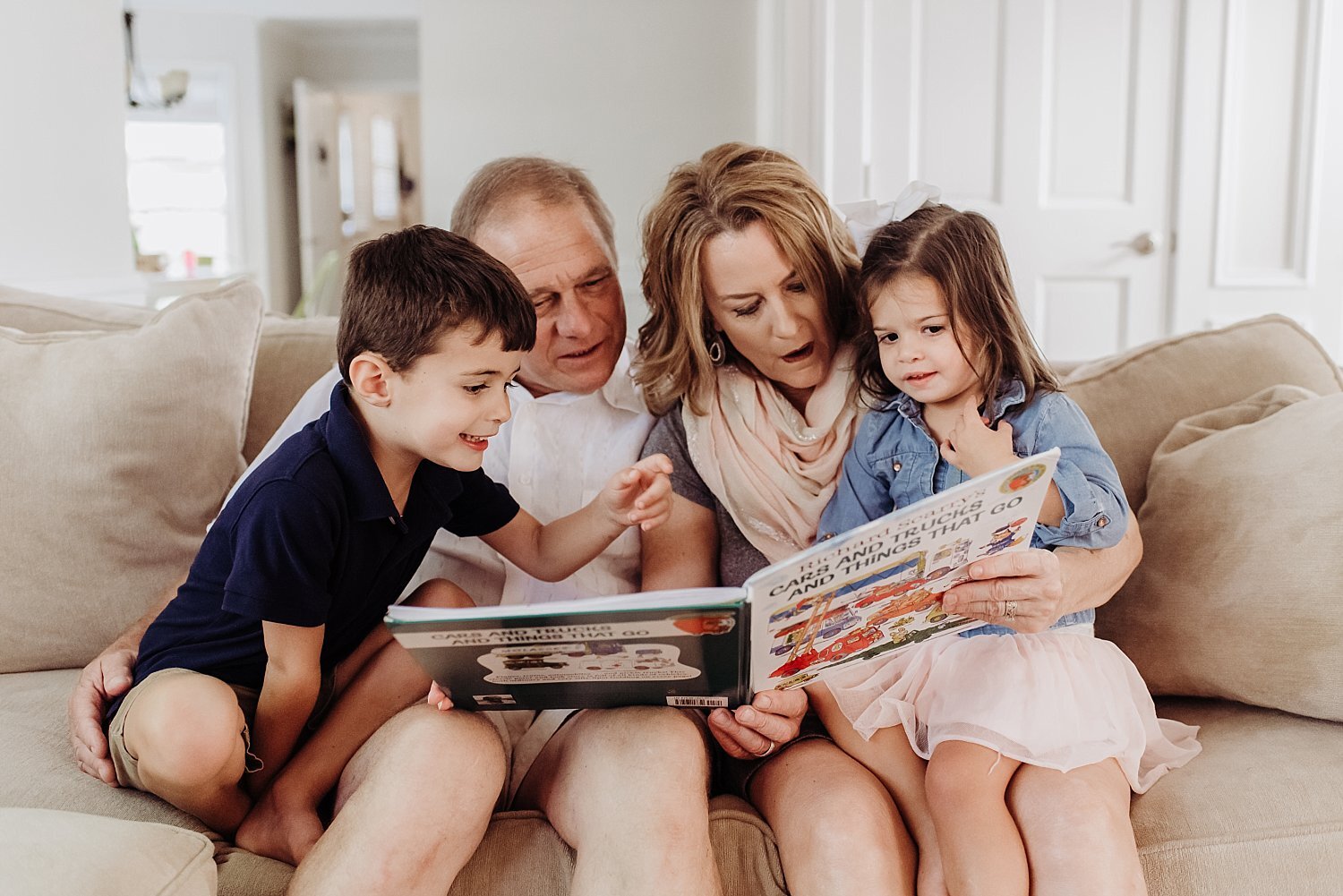 grandparents reading to grandchildren
