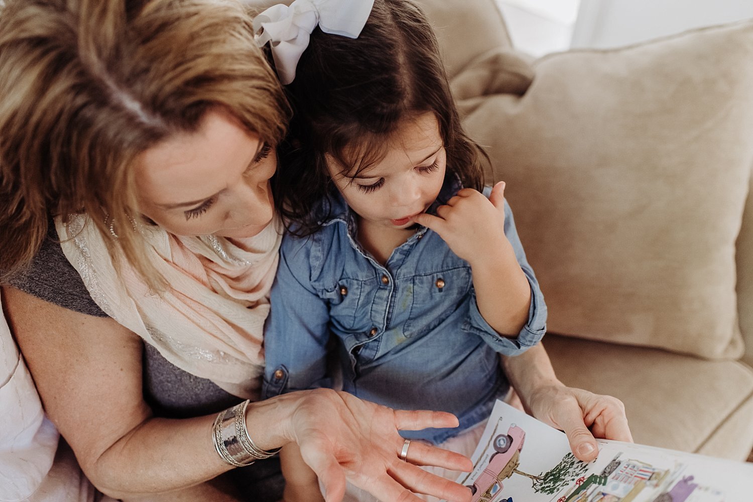 grandma reading to grandaughter