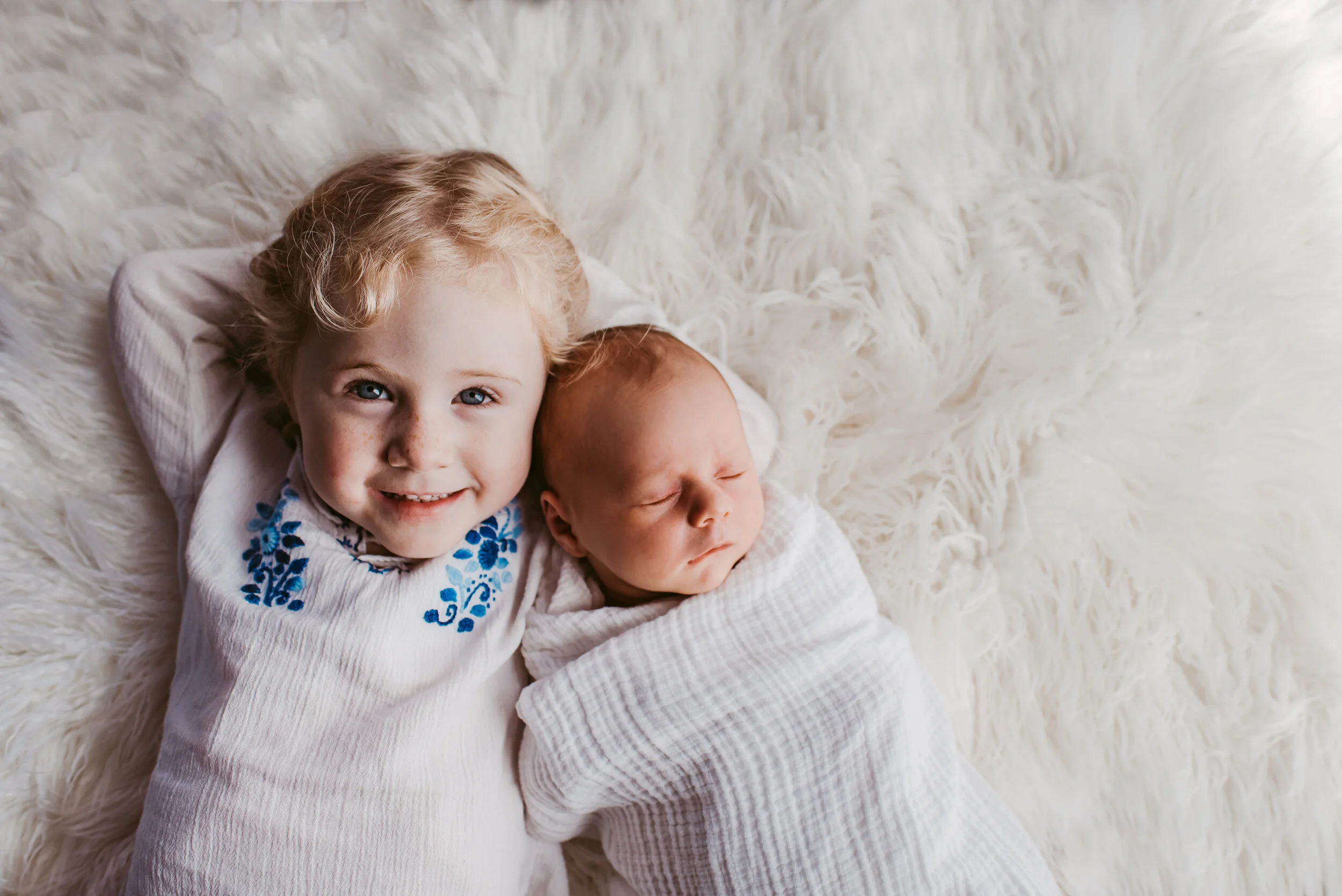 I shot 75% of this newborn session in this families dining room after moving over the dining room table a bit! There's a big window camera right that was letting in some gorgeous light!