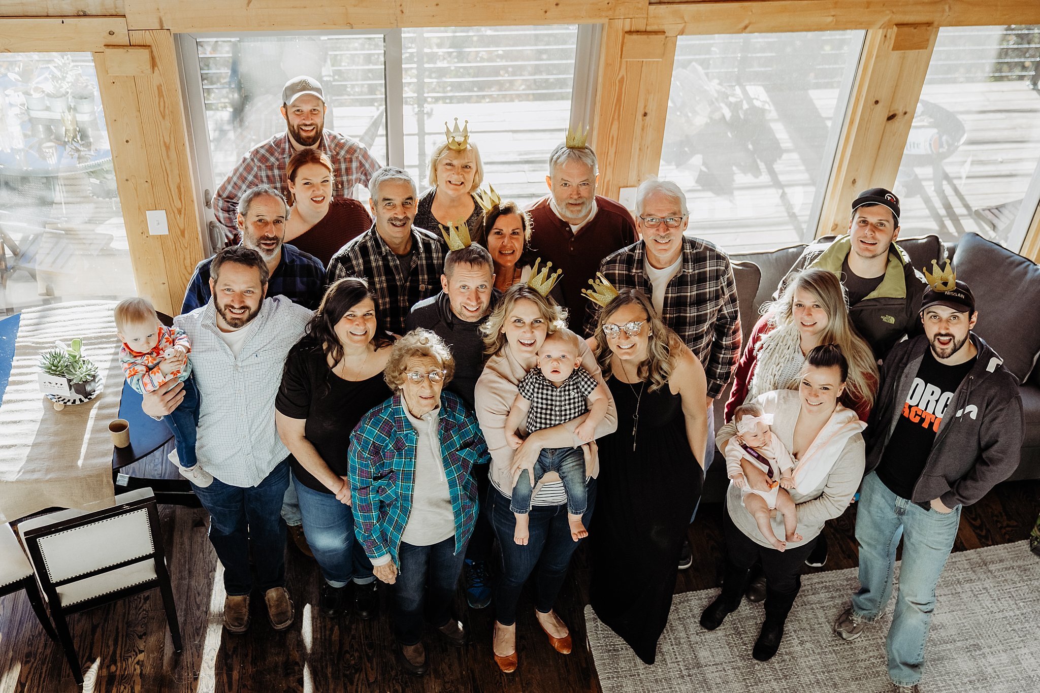 large family photo at first birthday party