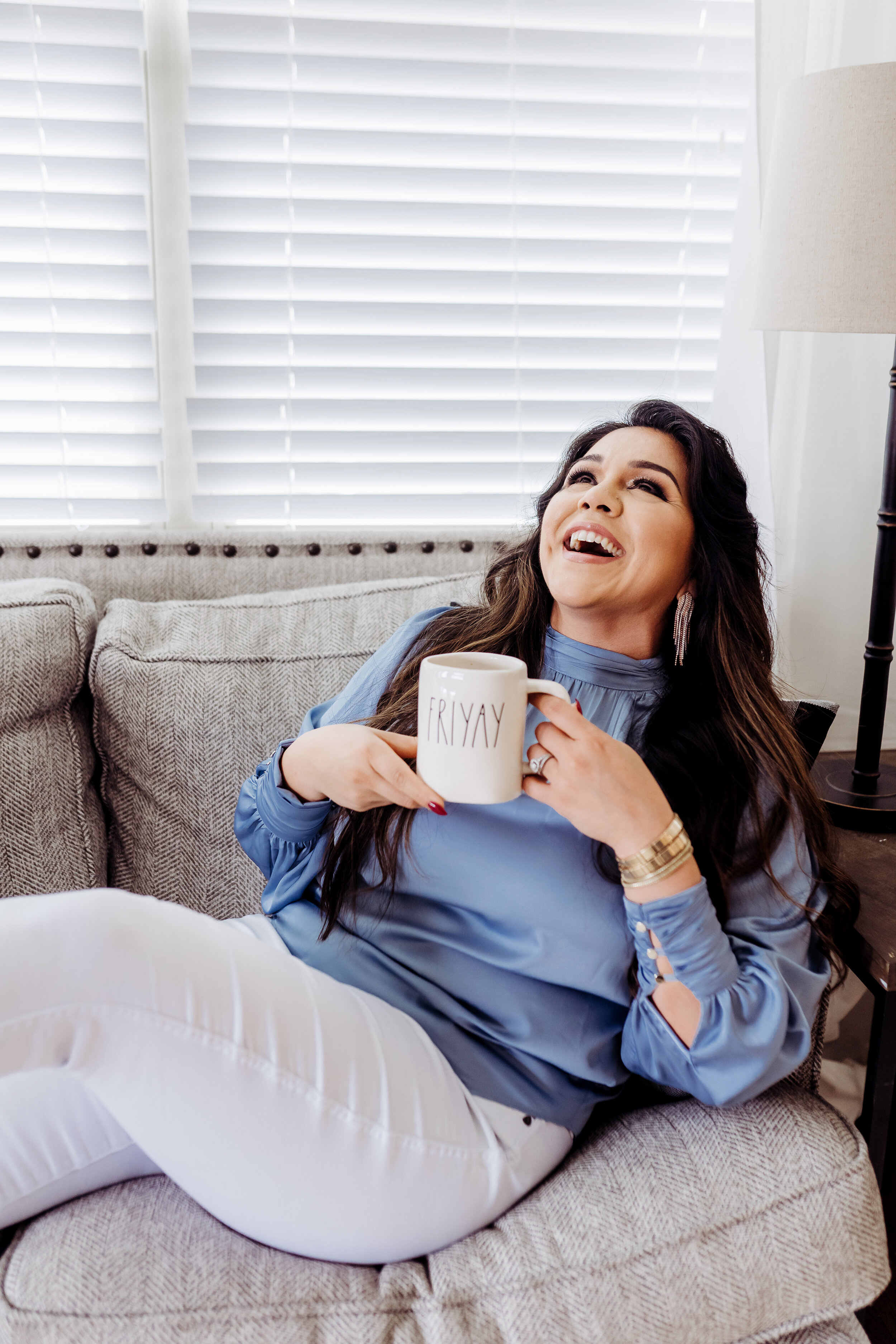 Realtor laughing on couch with FRIYAY Rae Dunn Mug Atlanta, GA Personal Brand Photo Session