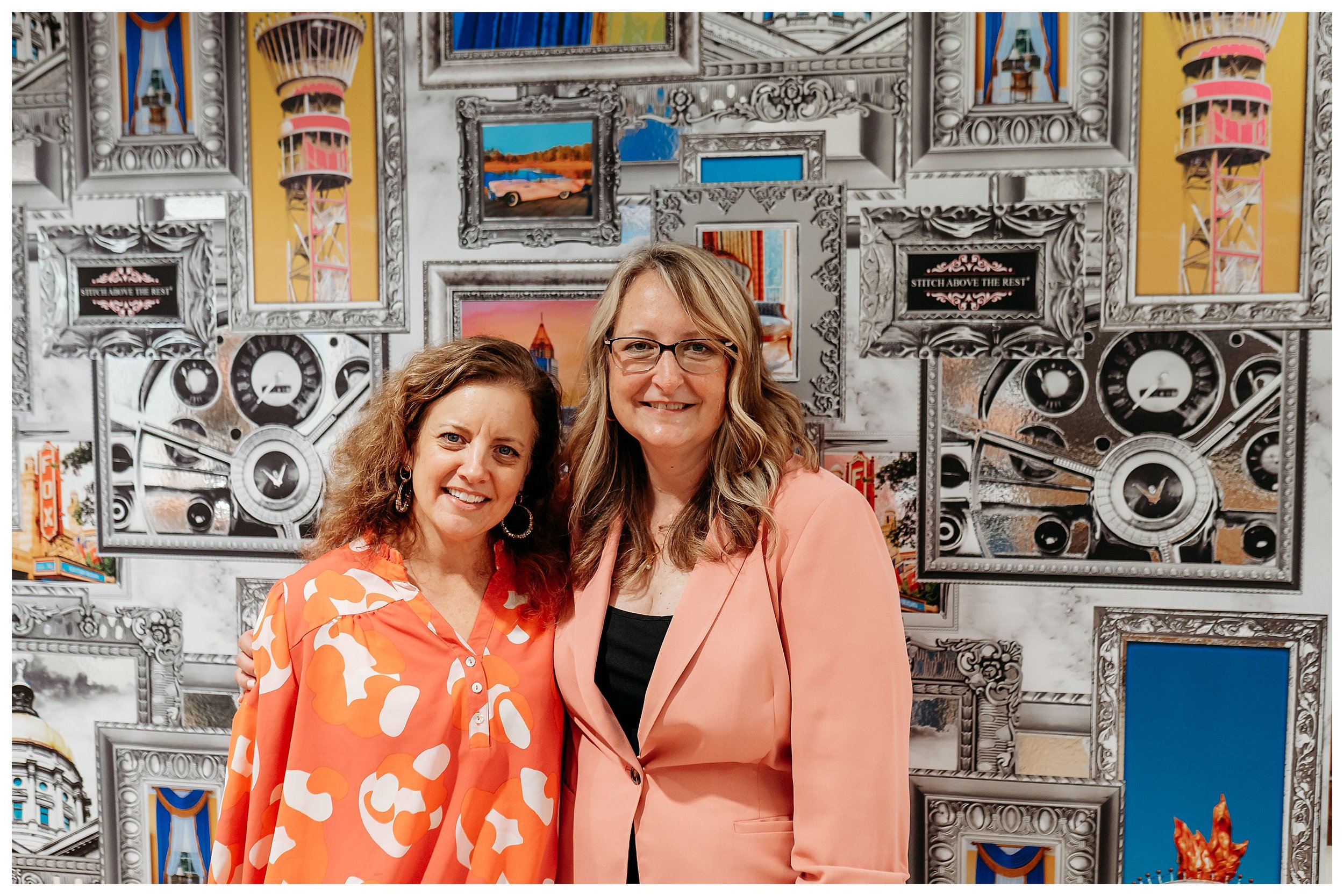 two women posing for photo at Stitch Above the Rest ribbon cutting for Woodstock, GA business event