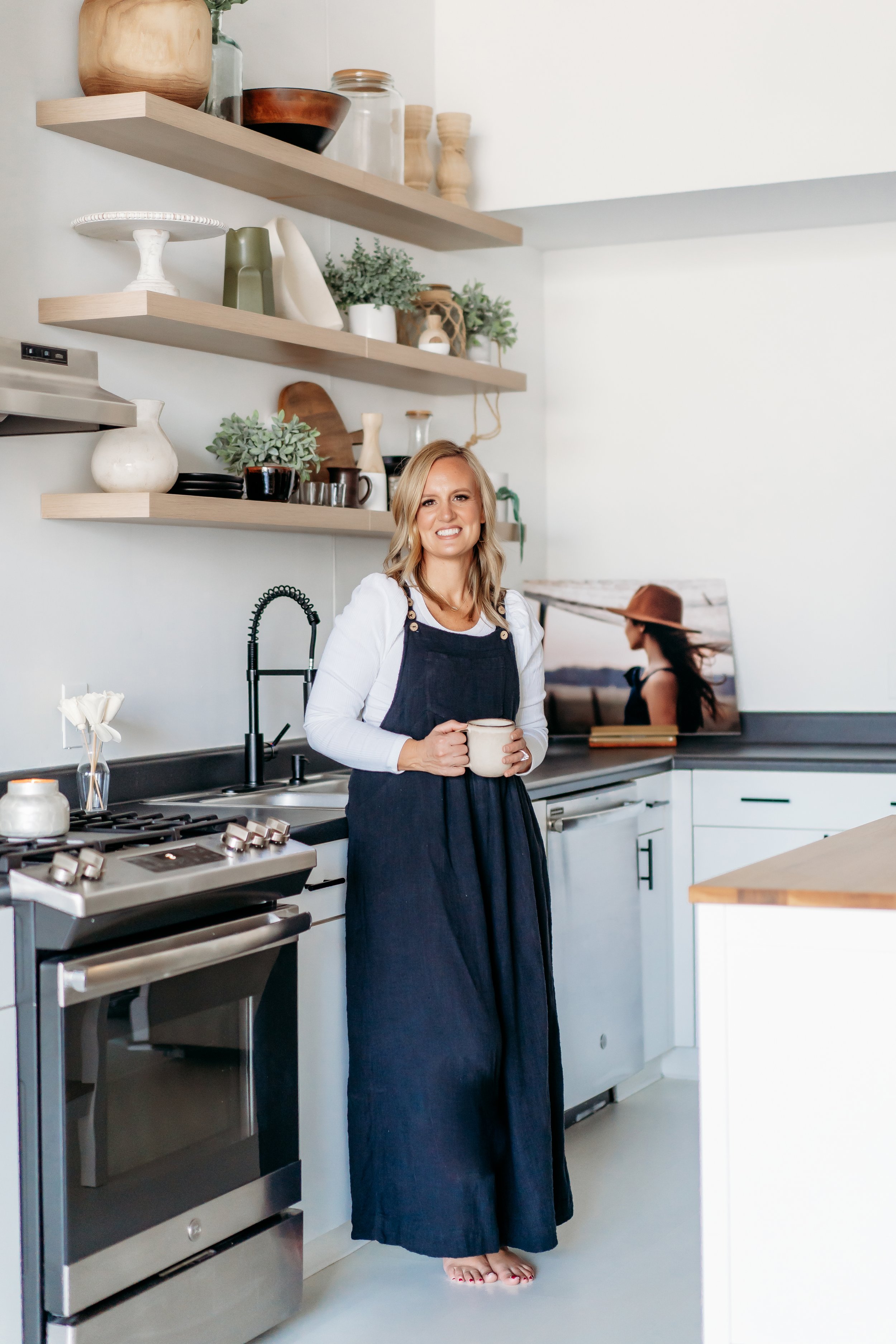 Photographer standing in kitchen headshot for photographer