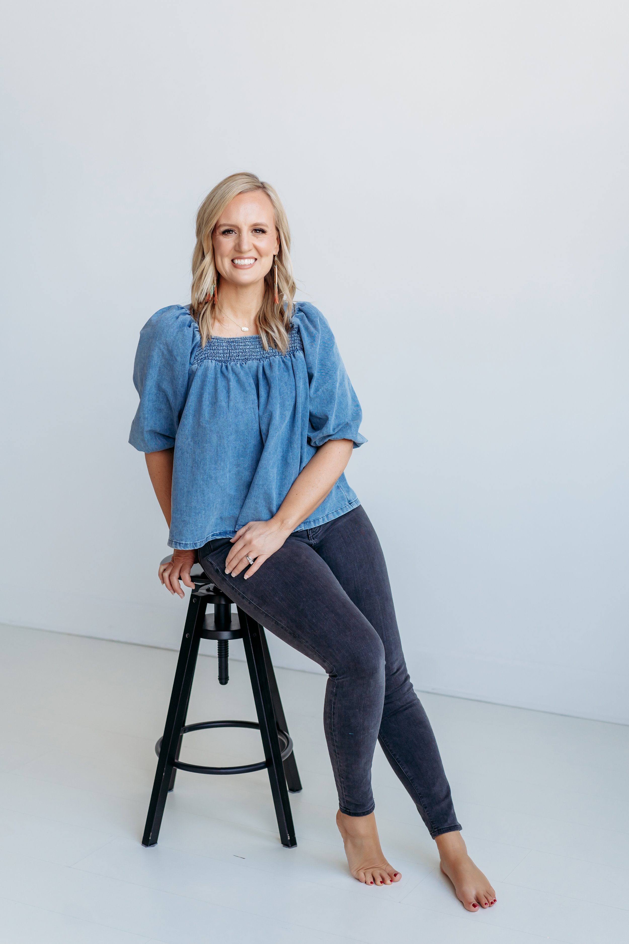 Atlanta Photographer headshot on stool