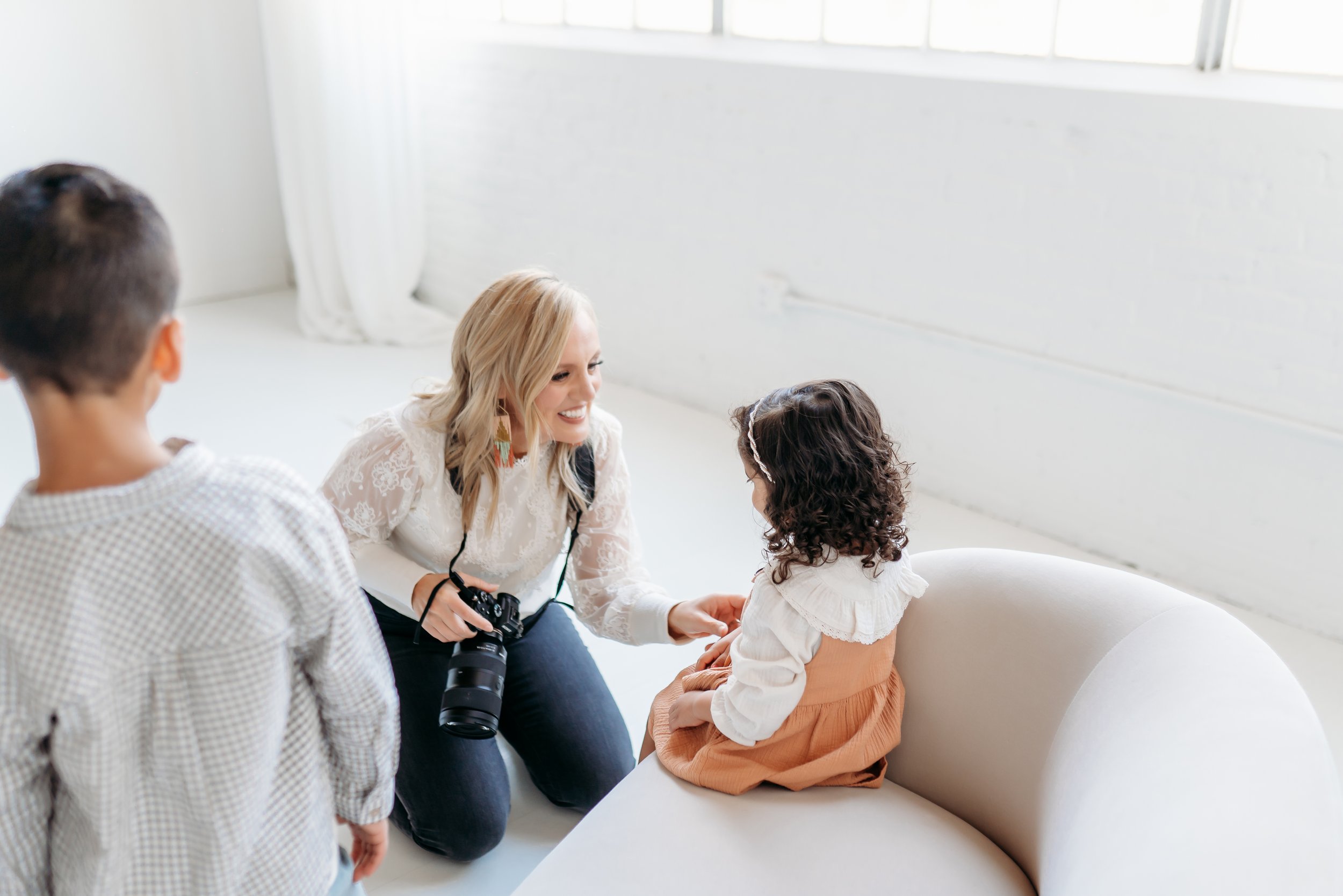 BTS Photo content of photographer talking to kids