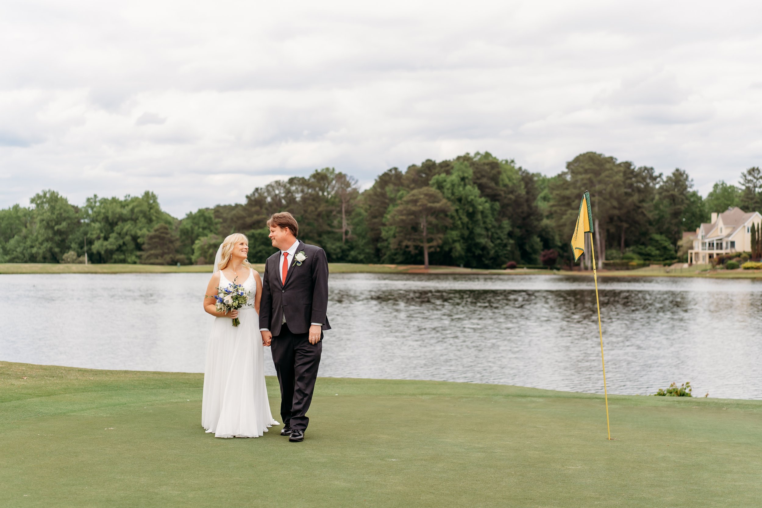 Wedding couple on golf course in Atlanta Country Club