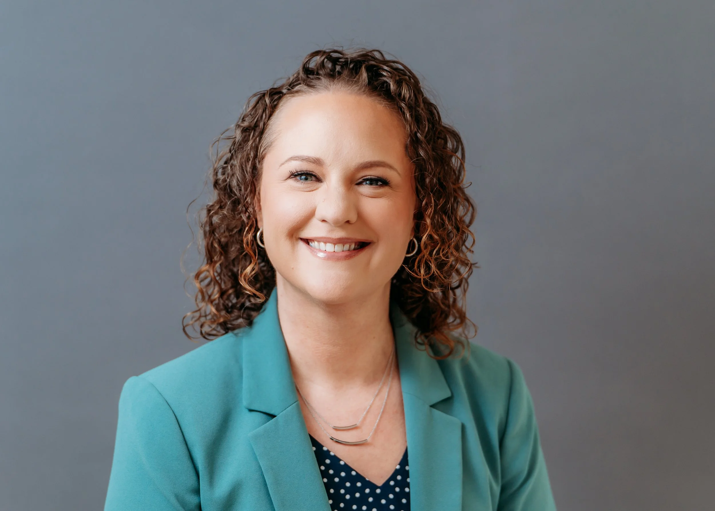 traditional headshot setup in studio with gray background in woodstock, ga studio