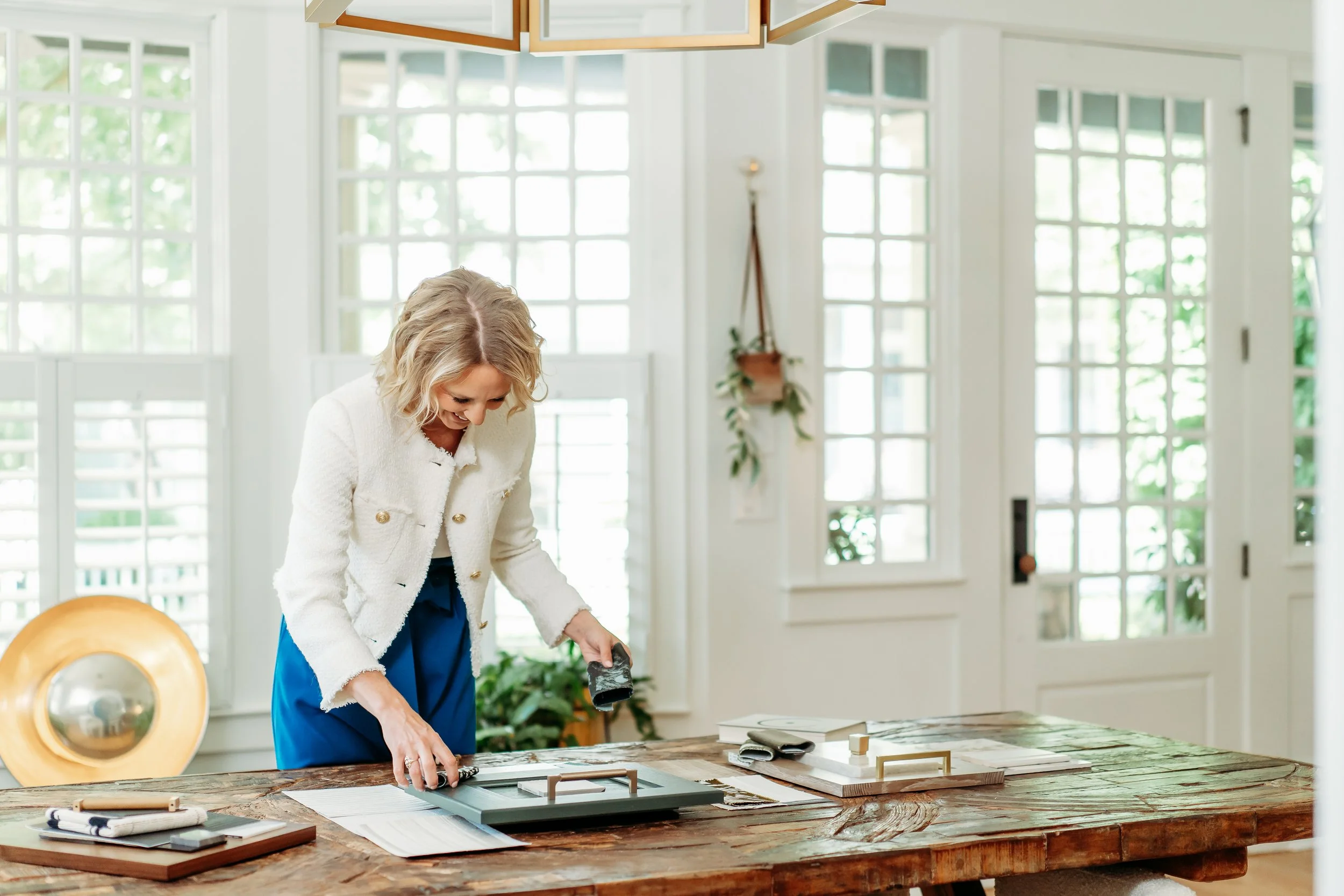 Lifestyle brand image of interior designer creating mood board