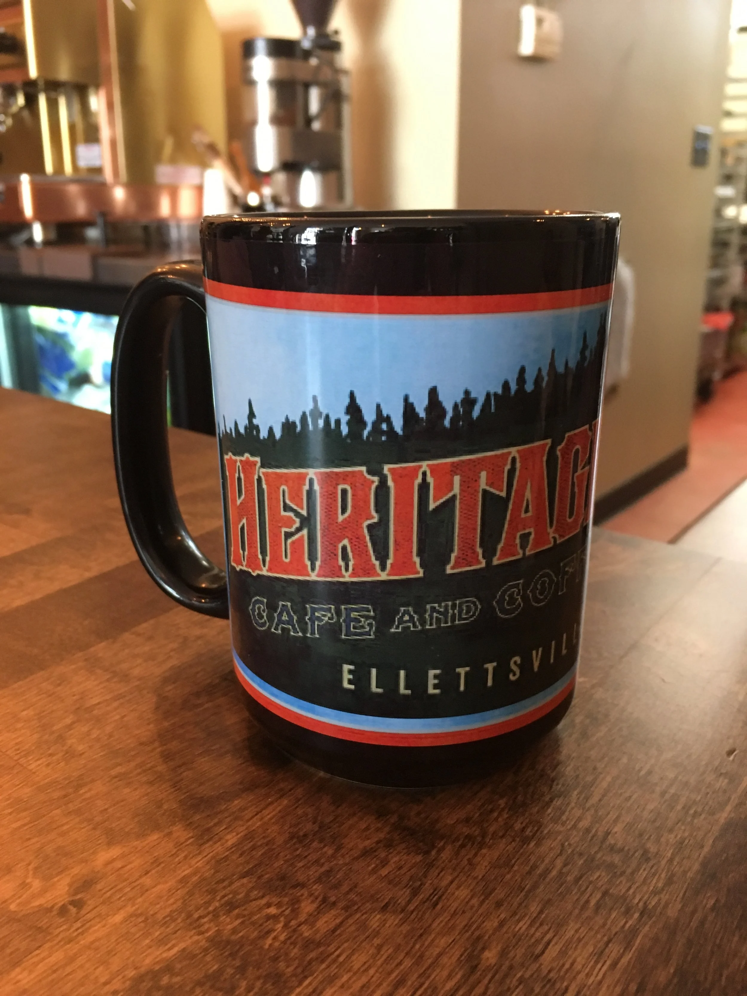 Become a Cup Club member when you purchase a mug! Members enjoy the 8oz price for any size fresh roast coffee and free refills in house.