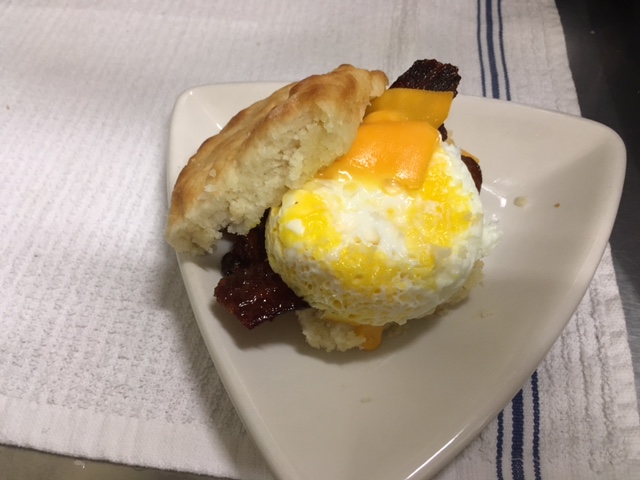 Try the breakfast sandwich on a homemade biscuit with our Signature thick cut candied cayenne bacon. Deliciously sweet and a little spicy.