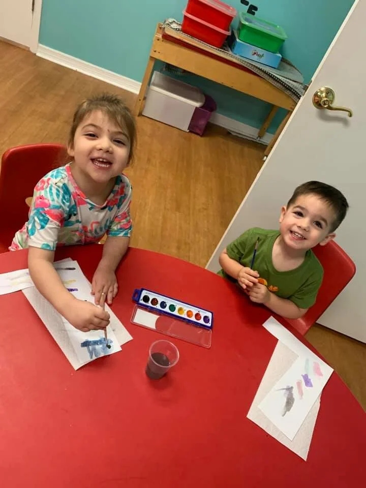 Lake Mary Childcare 3s Class painting a flower bouquet for the class watercolor projectBy kind permission of the students parents