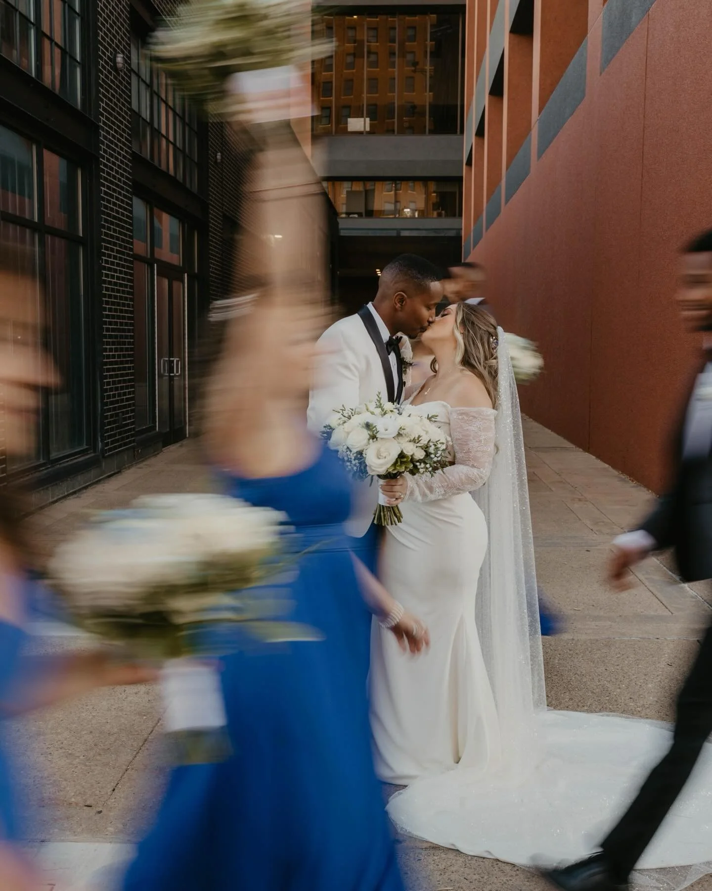 In the middle of the city, in the middle of the motion &mdash; they found stillness in each other.
&bull;
&bull;
#BrideAndGroom #WeddingPortraits #WeddingParty 
#CityWedding #UrbanWedding DowntownWedding 
TrueLoveStories WeddingDayMagic JustMarried 
