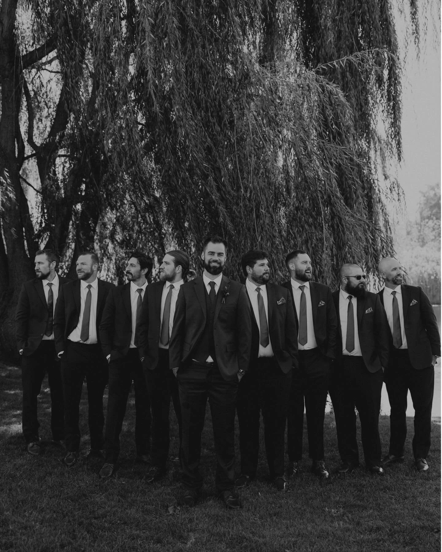 Timeless suits, effortless energy, and just the right amount of chaos under those trees.
&bull;
&bull;
#groomsmen #weddingphotographer #blackandwhitephotography #weddingvibes #groomstyle timelesswedding weddingdaymoments bridalparty moodytones weddin