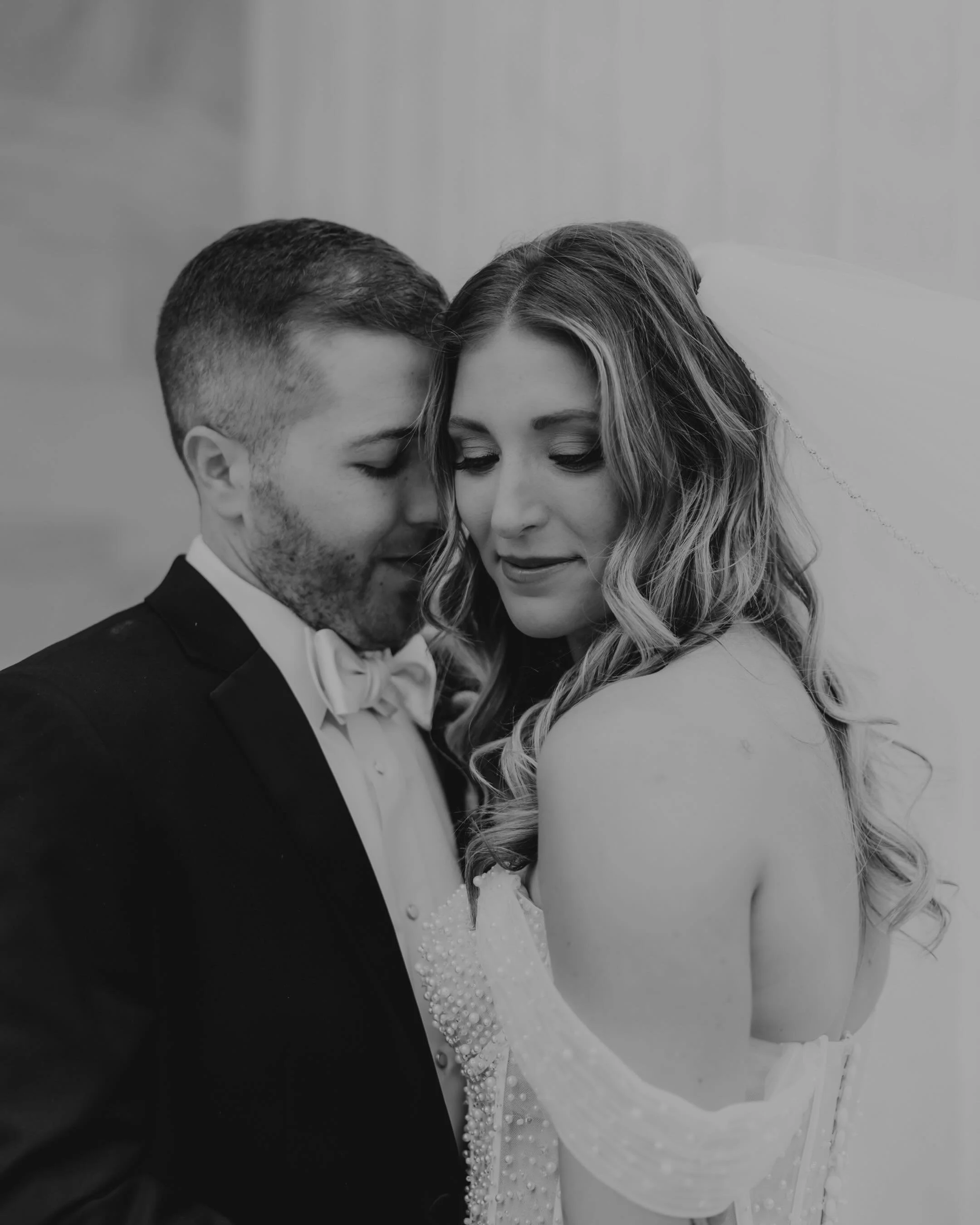 These are the moments that matter most&mdash;the in-between, the stillness, the forever. 
&bull;
&bull;
#WeddingPhotographer #BrideAndGroomPortraits #WeddingDayMagic #LuxuryWeddingPhotography #RomanticWeddingPhotos TimelessLove BlackAndWhiteWedding C