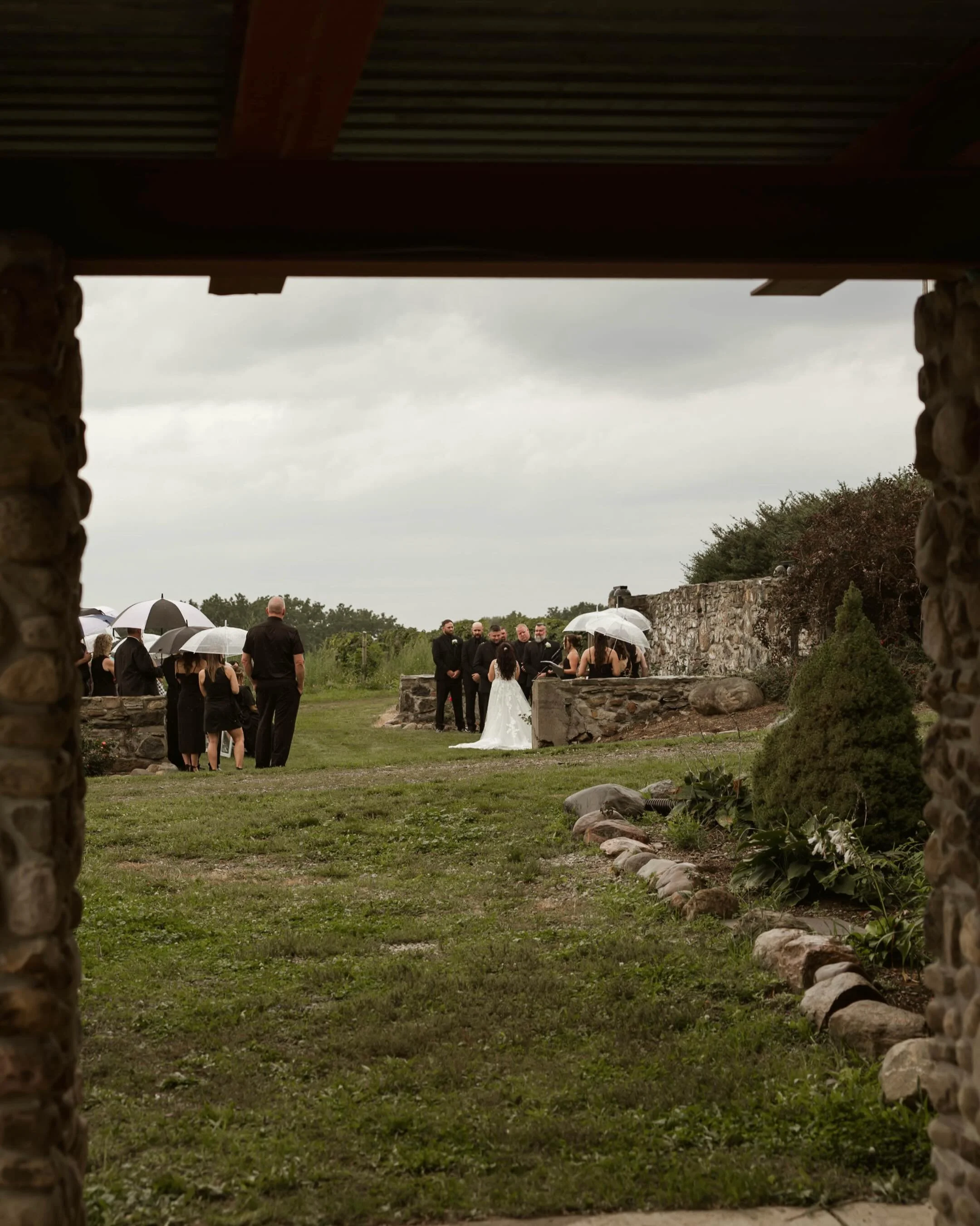 Rainy vows, quiet moments, and a love that somehow feels even more romantic beneath a gray sky. 🤍🌧️

(Special thanks to @rileyphoto @jb_photography_ny for helping out with this day) 
&bull;
&bull;
#WNYWeddingPhotographer #BuffaloWeddingPhotographer