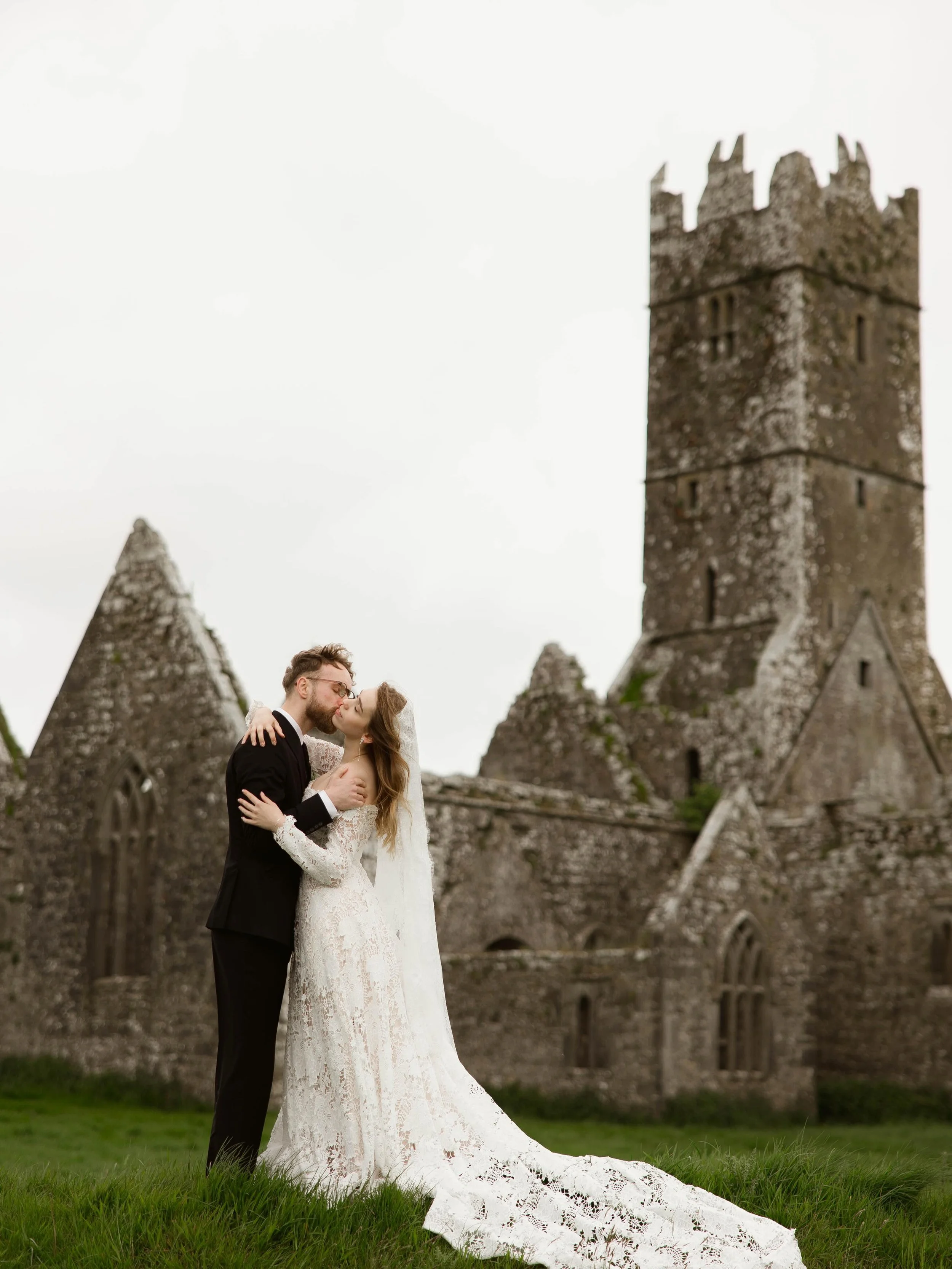 Ancient stone walls, wild Irish skies, and a love that feels just as timeless. 🤍🍀
&bull;
&bull;
Host: @vowandventure.co 
Elopement couple: @london.model.couple 
Dress : @rawgoldenrentals 
Florals: @yescasflowers