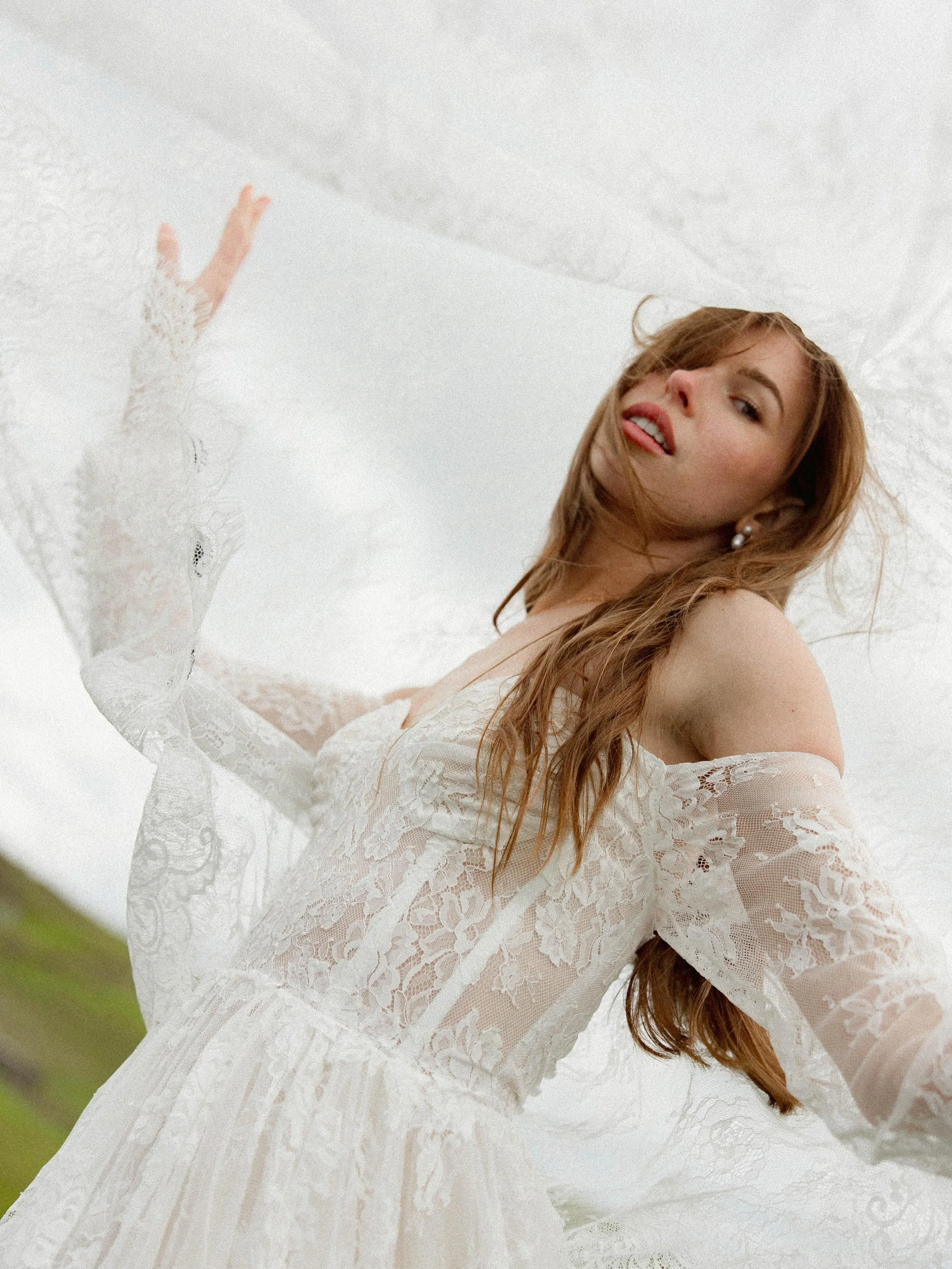 Wind in her hair, lace in the breeze, and a kind of magic you can only find somewhere far from home. 🇮🇪✨
&bull;
&bull;
Host: @vowandventure.co 
Model: @madisonandgabriel 
Dress: @eleanorsbridal 
&bull;
#IrelandWeddingPhotographer #IrelandPhotograph