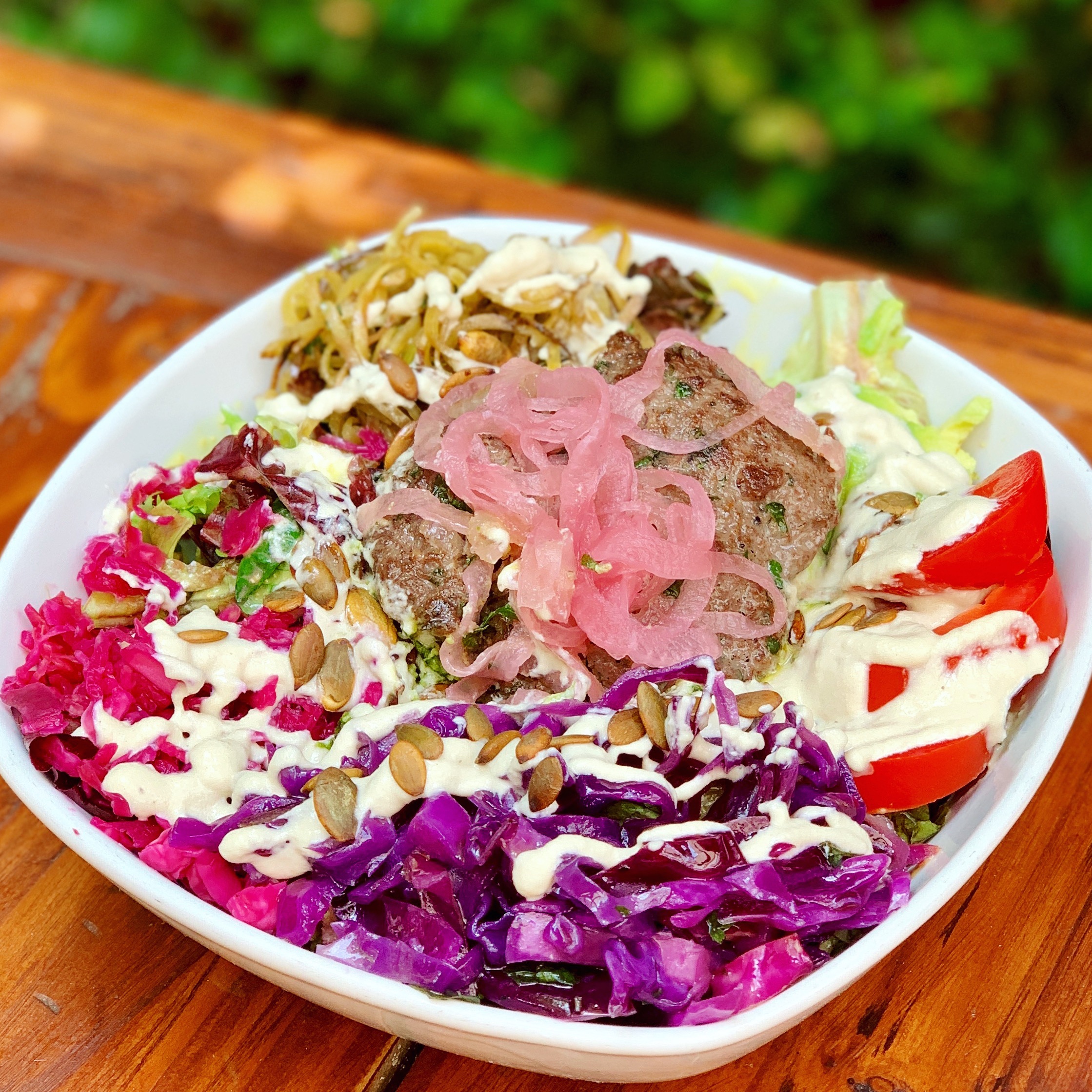 This bowl I ate on our baby moon in Ojai, CA was loaded with probiotics (there were several types of fermented veggies in there and not to mention all the different colors) and other pregnancy-friendly foods (hello grass-fed bison burger).