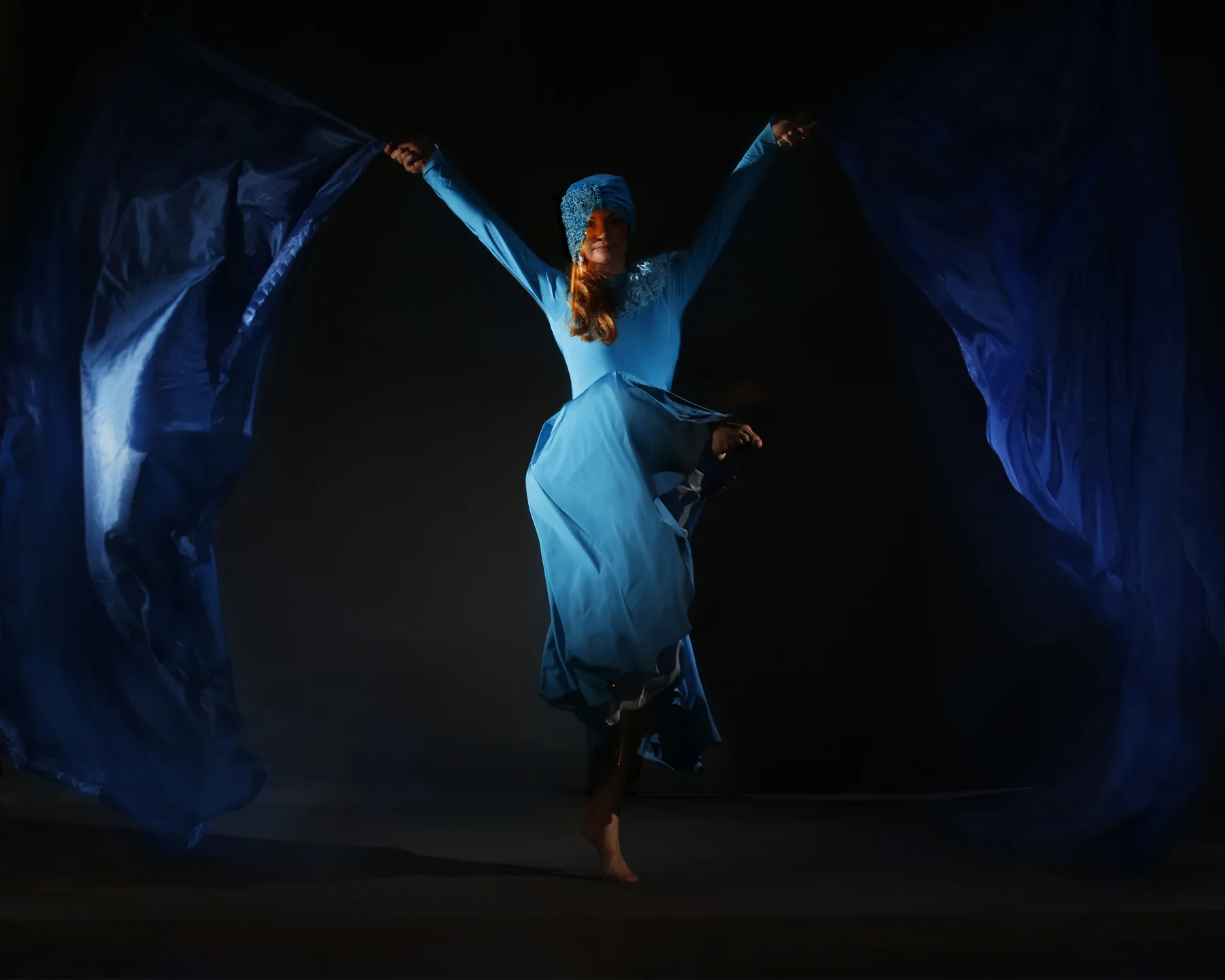 Light Emitting Dance in blue, flag performance, Divine Company.jpg