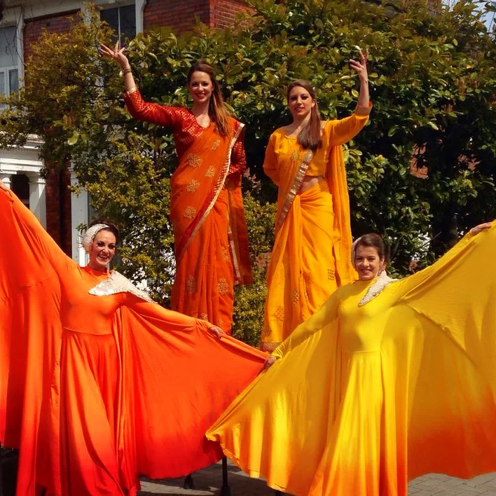 Bollywood, stilt and Optioscope performance, Divine Company.jpg