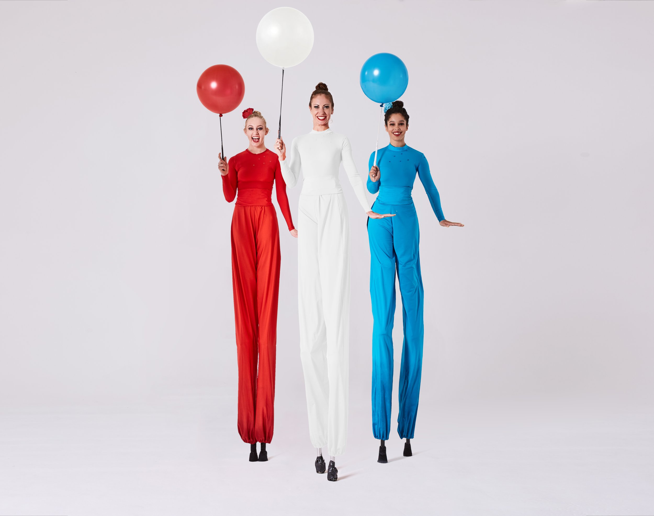 Colour Collection, stilt performance in red, white and blue block colours, Divine Company.jpg