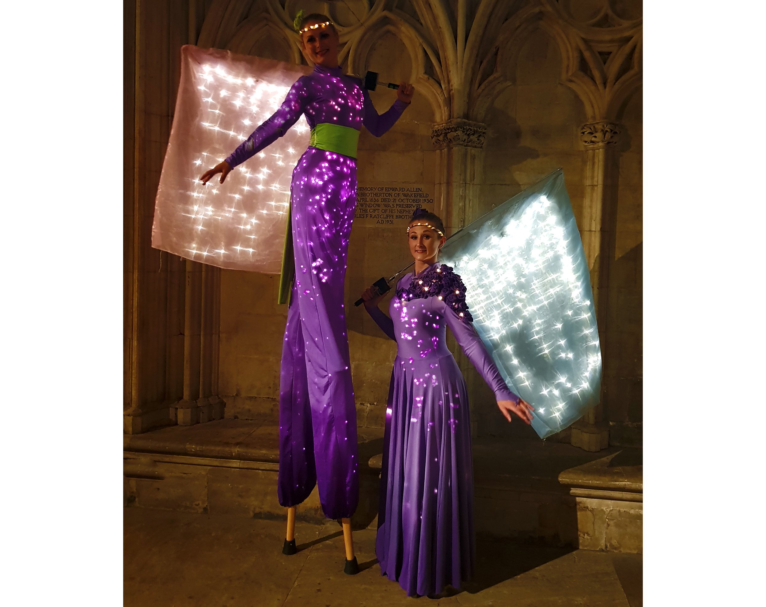 Colour Collection, lilac stilt and ground based illuminated flag performance, Divine Company.jpg