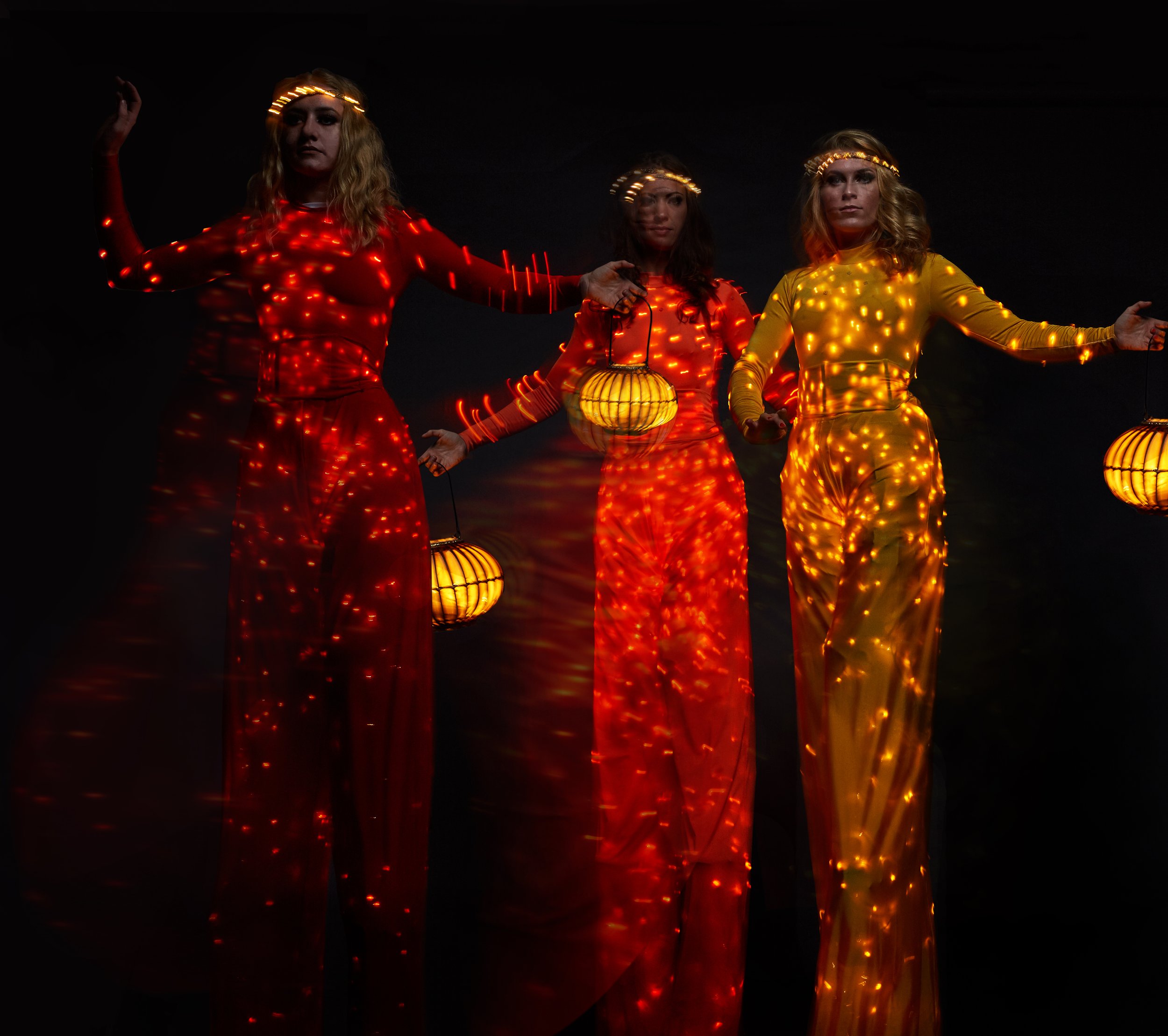 Colour Collection, illuminated stilt performance with lanterns in red, yellow and orange, Divine Company.jpg