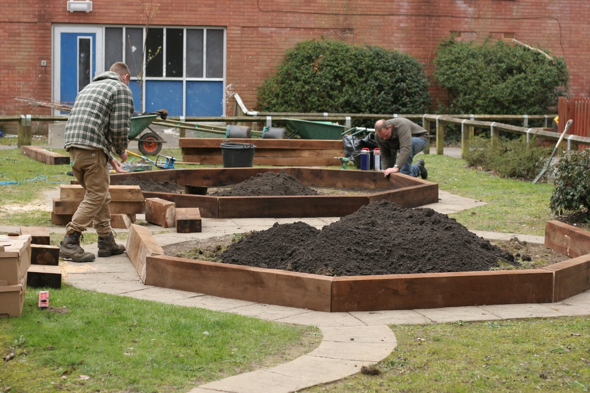 Lordshill - Plot 1  03-2014 Peter and James of Landscape Therapy building beds.jpg